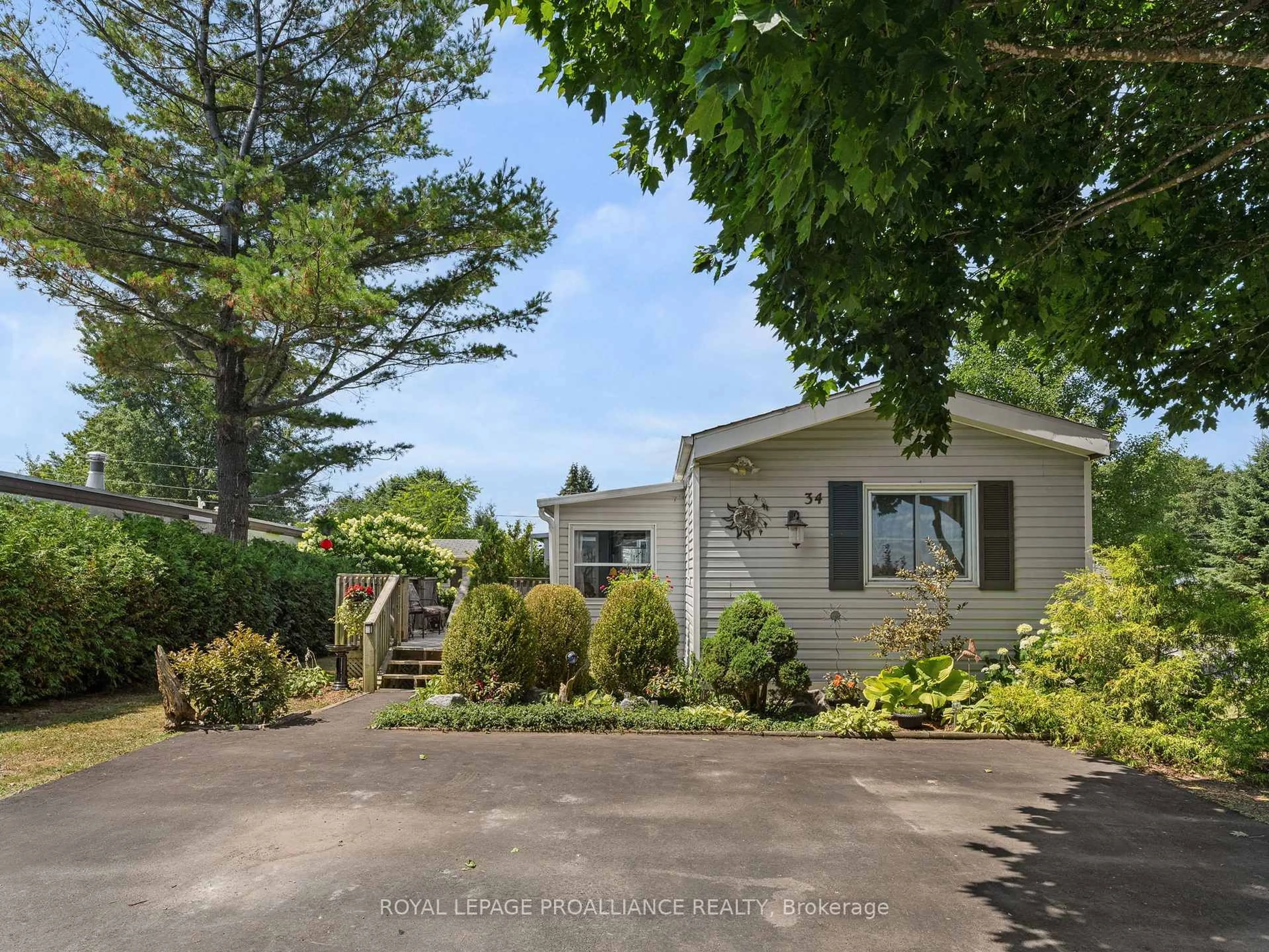 A pic from outside/outdoor area/front of a property/back of a property/a pic from drone, street for 34 Basher Dr, Hamilton Township Ontario K9A 4J7