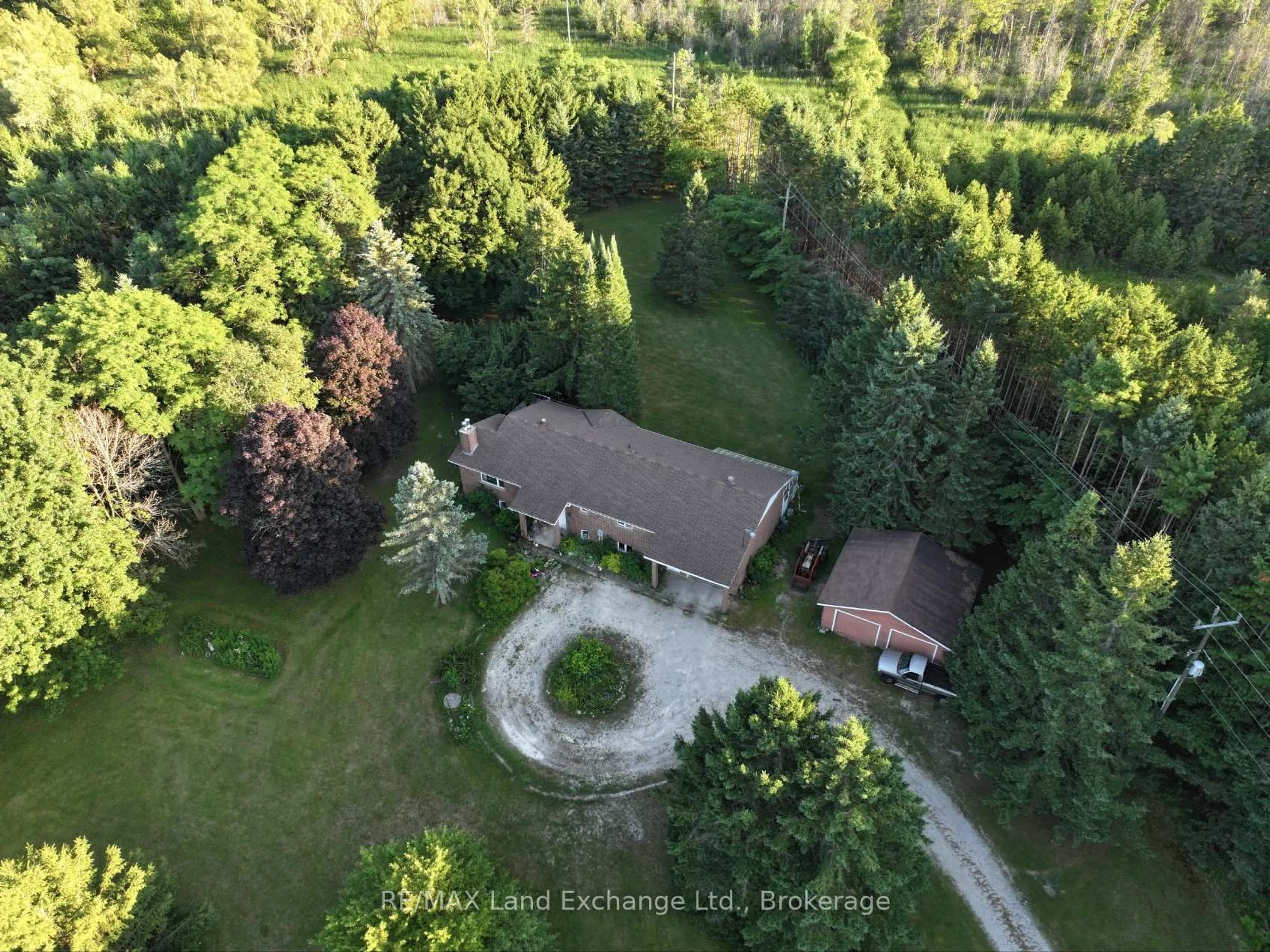 A pic from outside/outdoor area/front of a property/back of a property/a pic from drone, forest/trees view for 340 South St, Brockton Ontario N0G 2V0