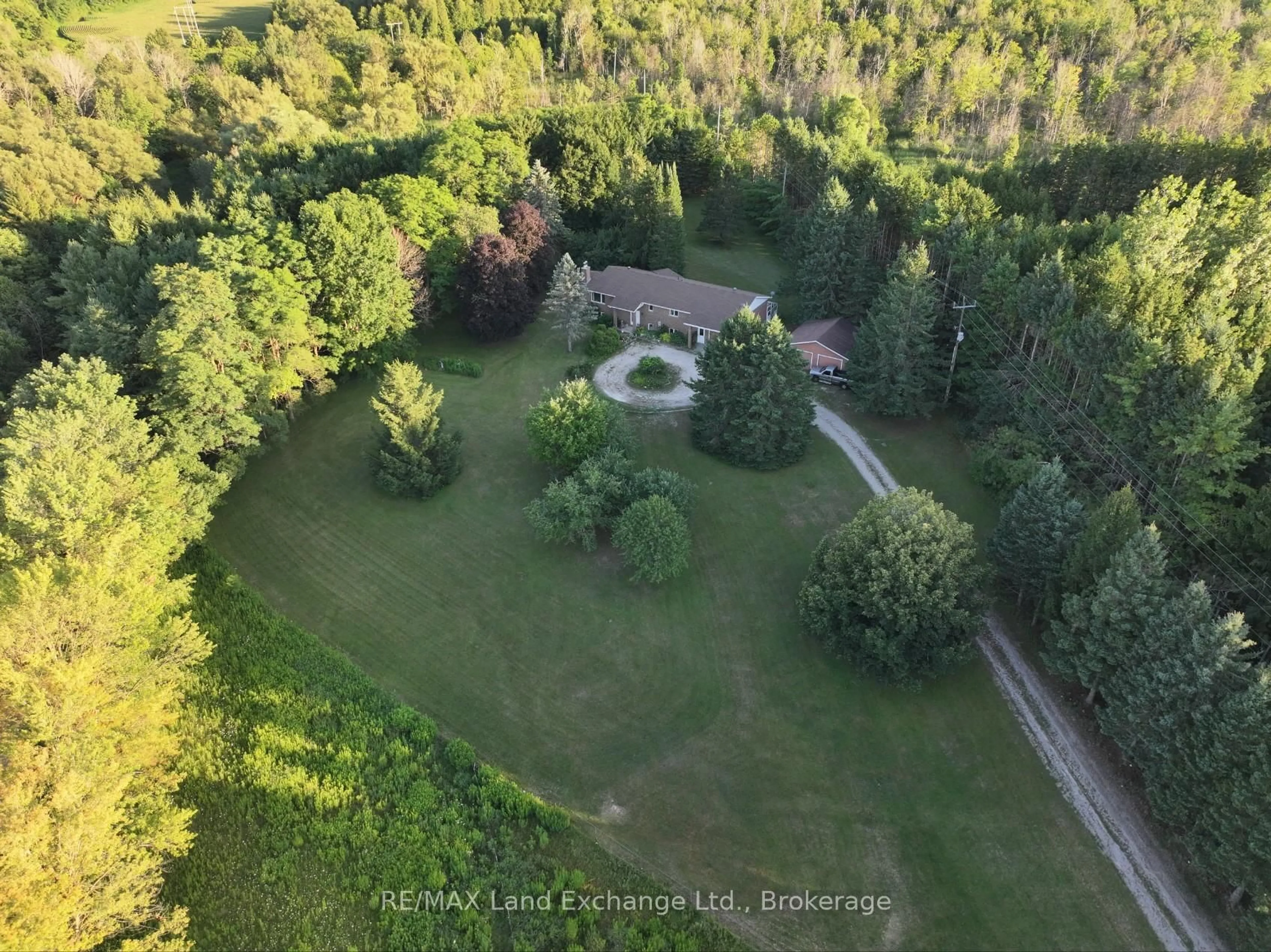 A pic from outside/outdoor area/front of a property/back of a property/a pic from drone, forest/trees view for 340 South St, Brockton Ontario N0G 2V0