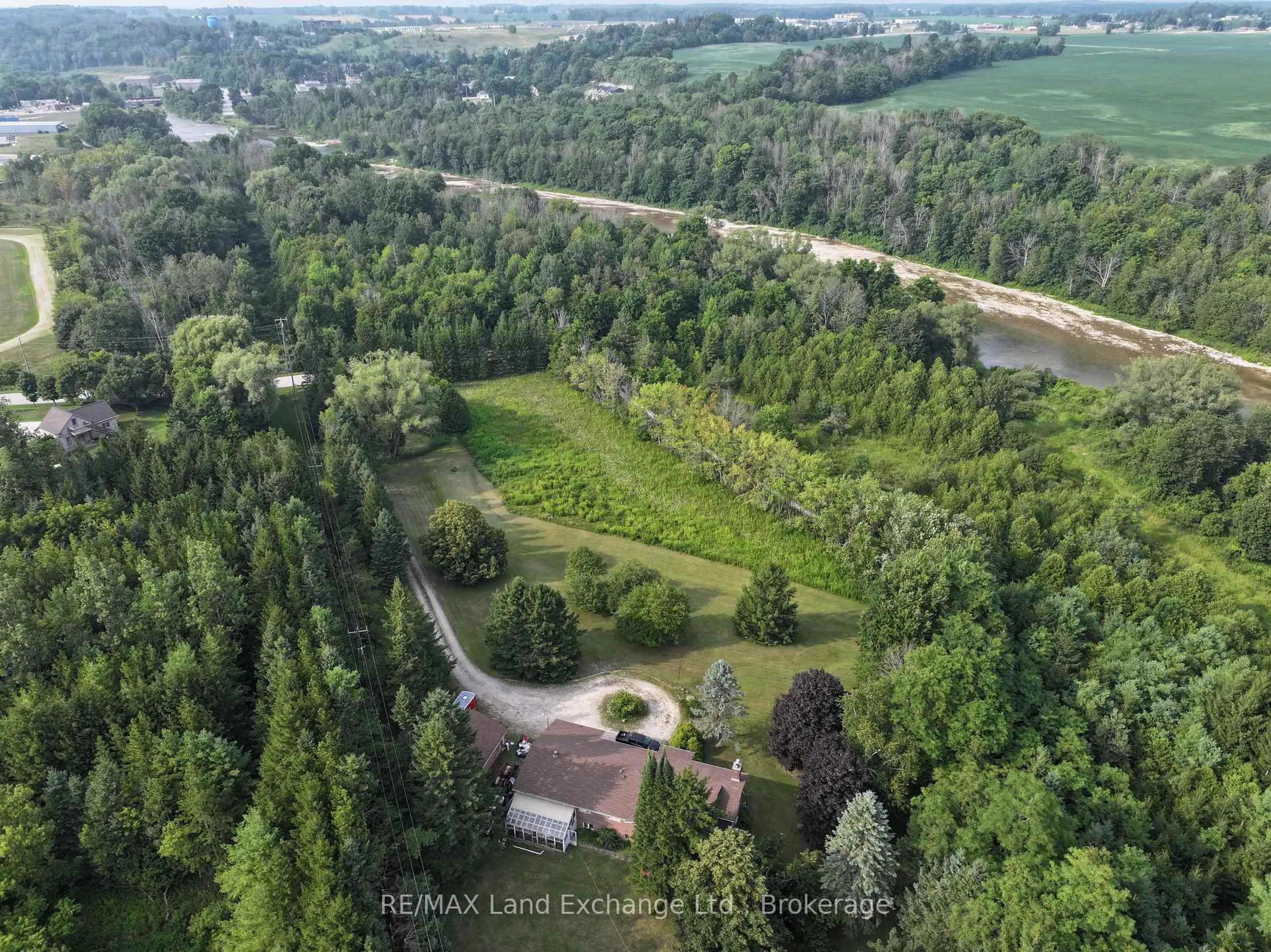 A pic from outside/outdoor area/front of a property/back of a property/a pic from drone, forest/trees view for 340 South St, Brockton Ontario N0G 2V0