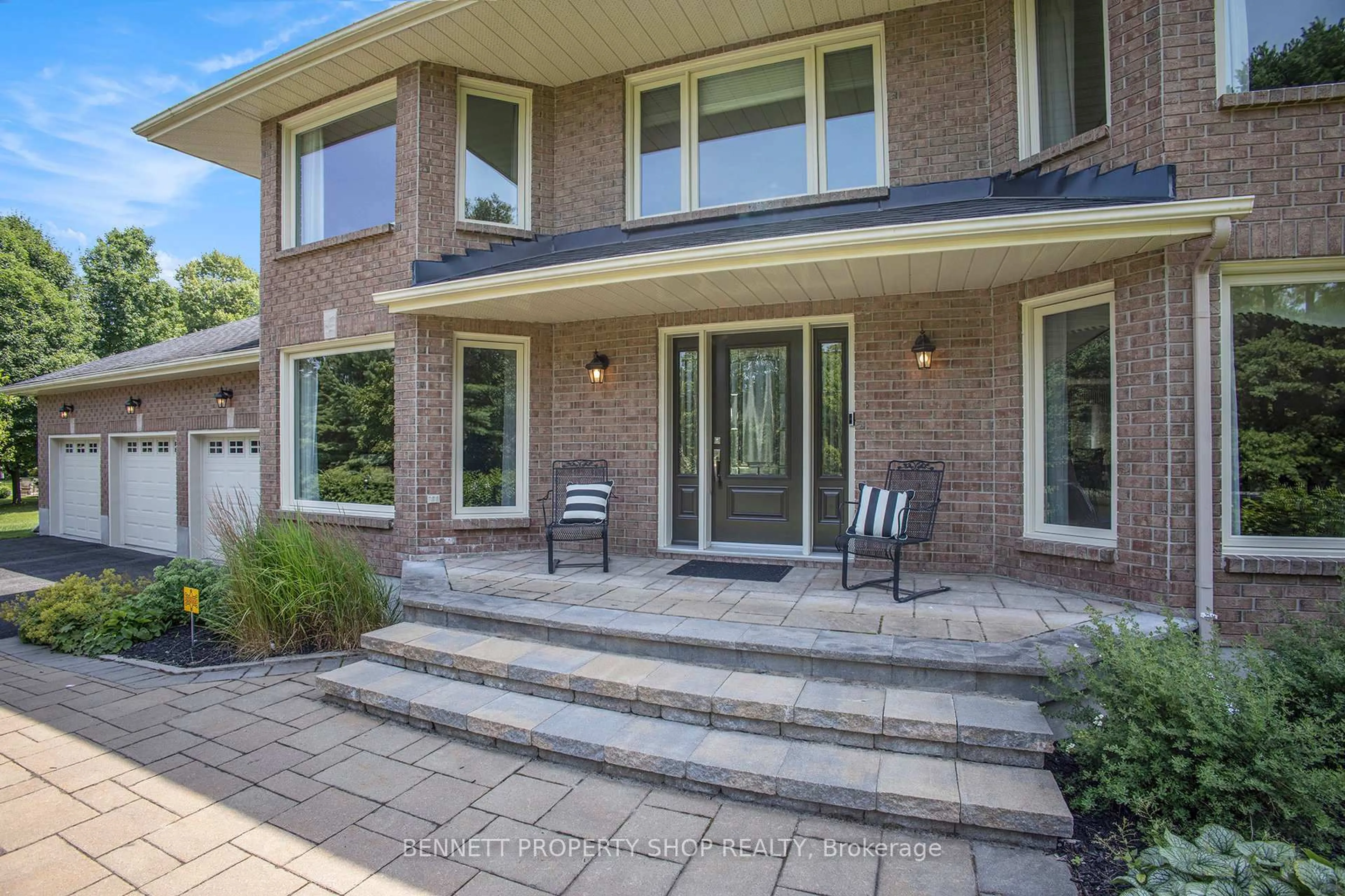 Home with brick exterior material, street for 1410 Sherruby Way, Kanata Ontario K2W 1B1