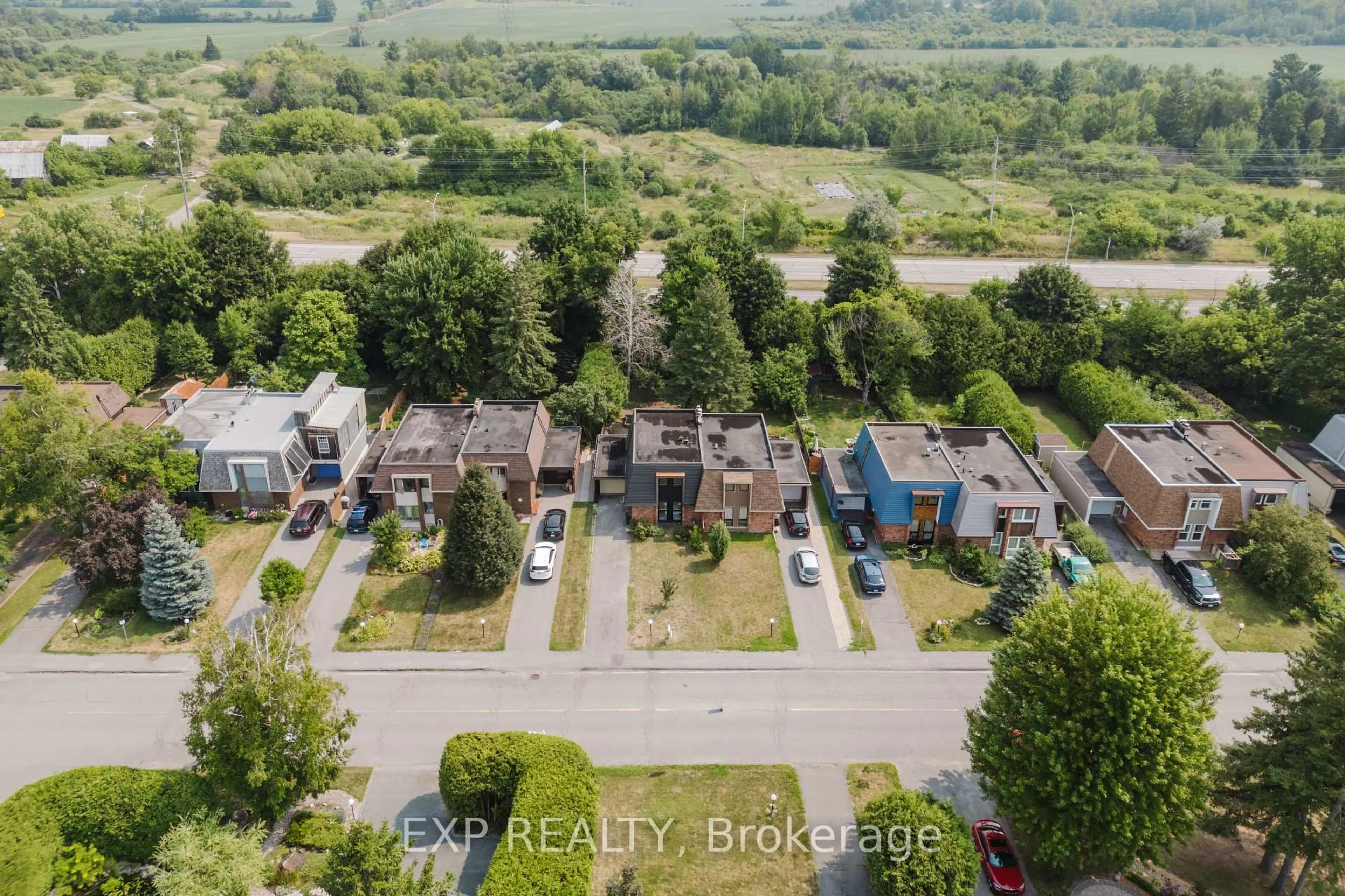 A pic from outside/outdoor area/front of a property/back of a property/a pic from drone, street for 91 Penfield Dr, Ottawa Ontario K2K 1L9