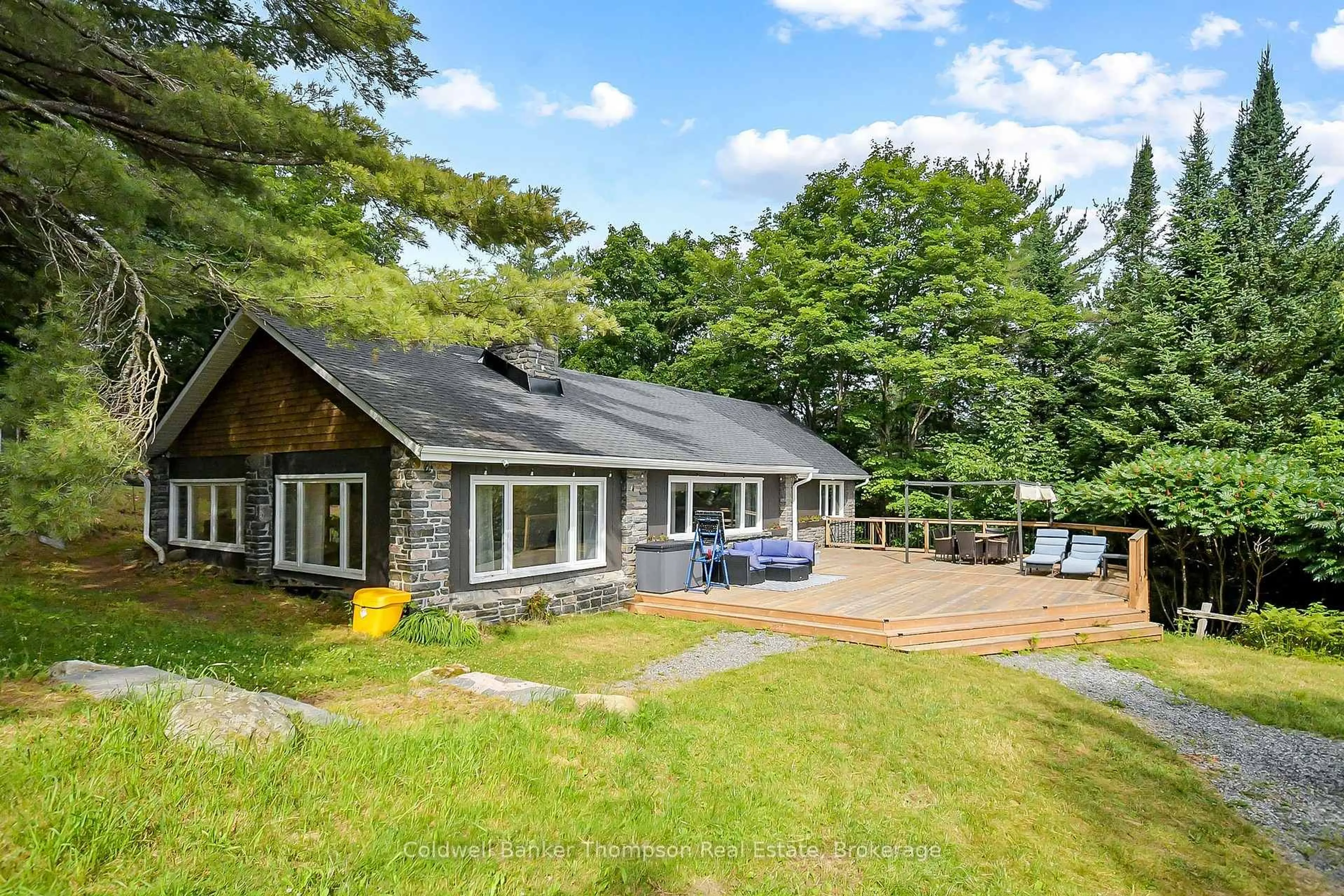 A pic from outside/outdoor area/front of a property/back of a property/a pic from drone, water/lake/river/ocean view for 179 Hoths Lane, Huntsville Ontario P0B 1L0