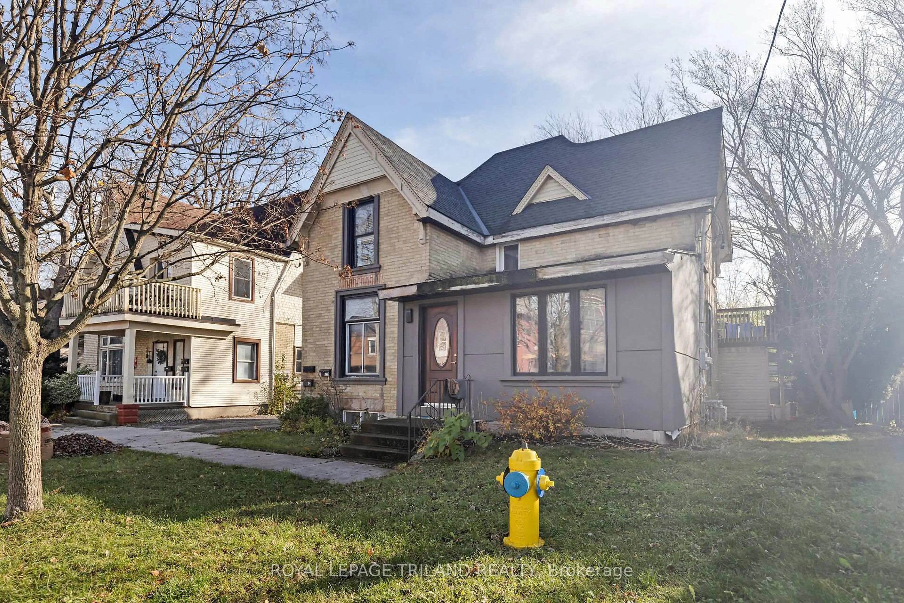 Home with brick exterior material, street for 94 Stanley St, London South Ontario N6C 1B1