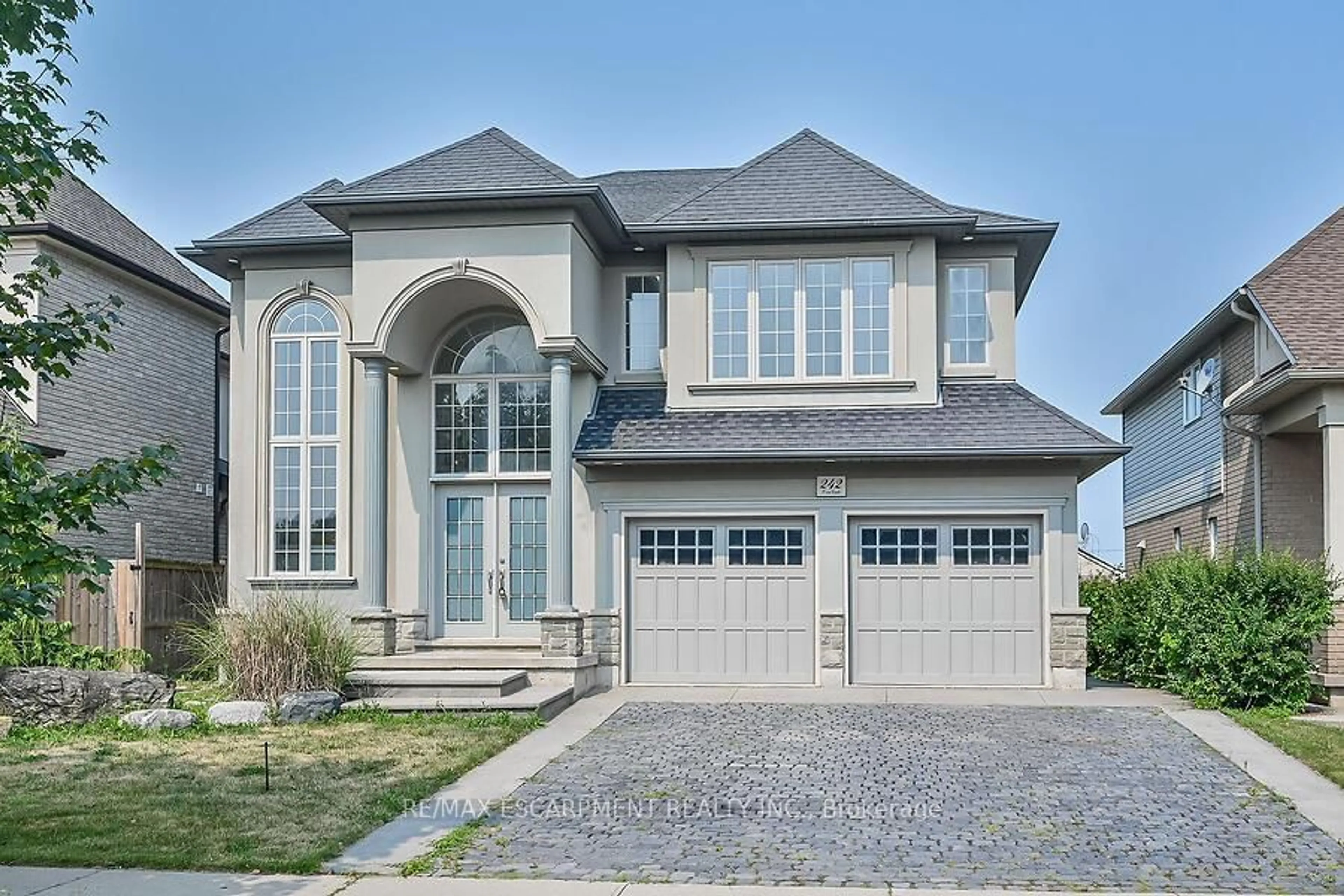 Home with brick exterior material, street for 242 Eringate Dr, Hamilton Ontario L8J 3Z2