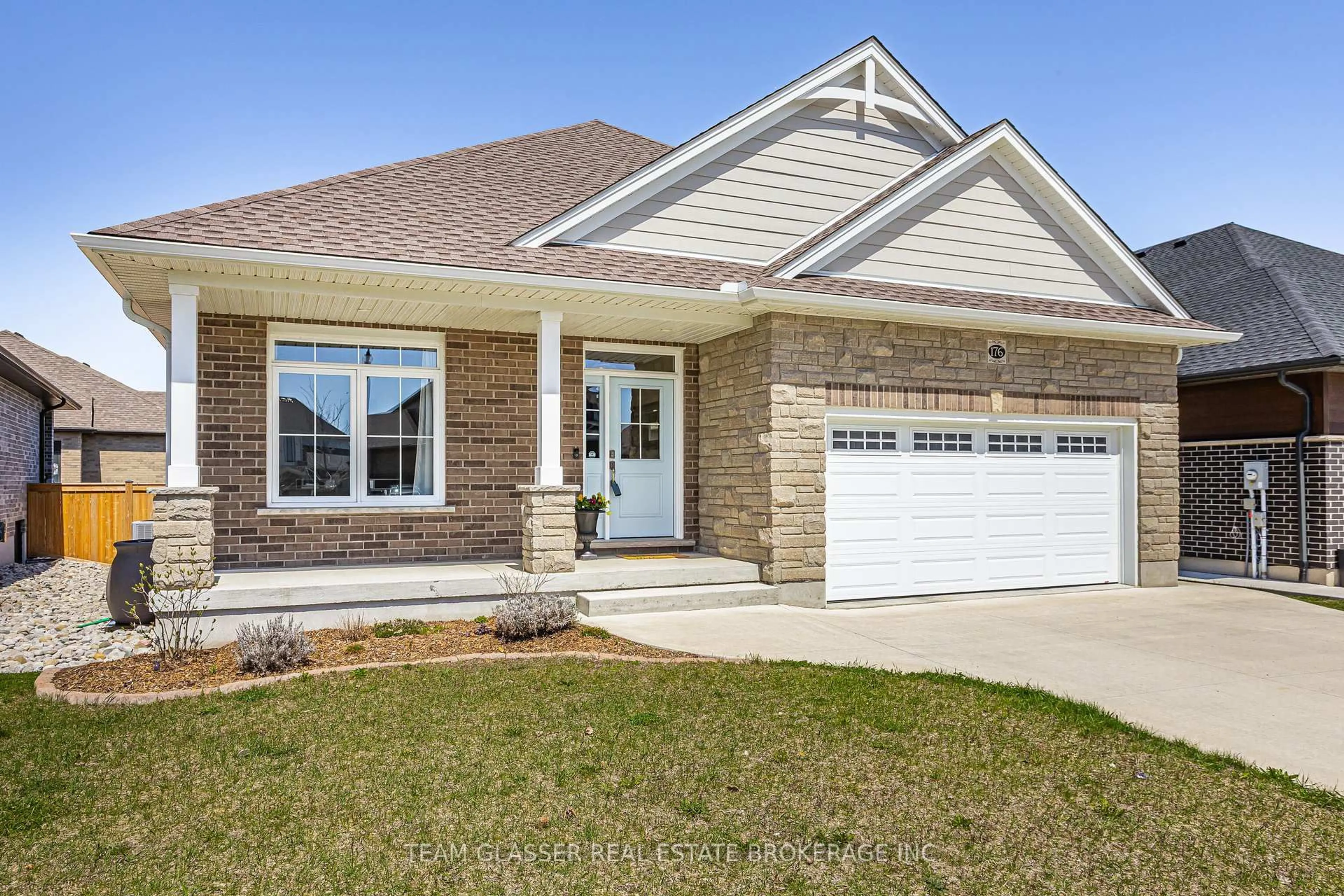 Home with brick exterior material, street for 176 BOARDWALK Way, Thames Centre Ontario N0L 1G2