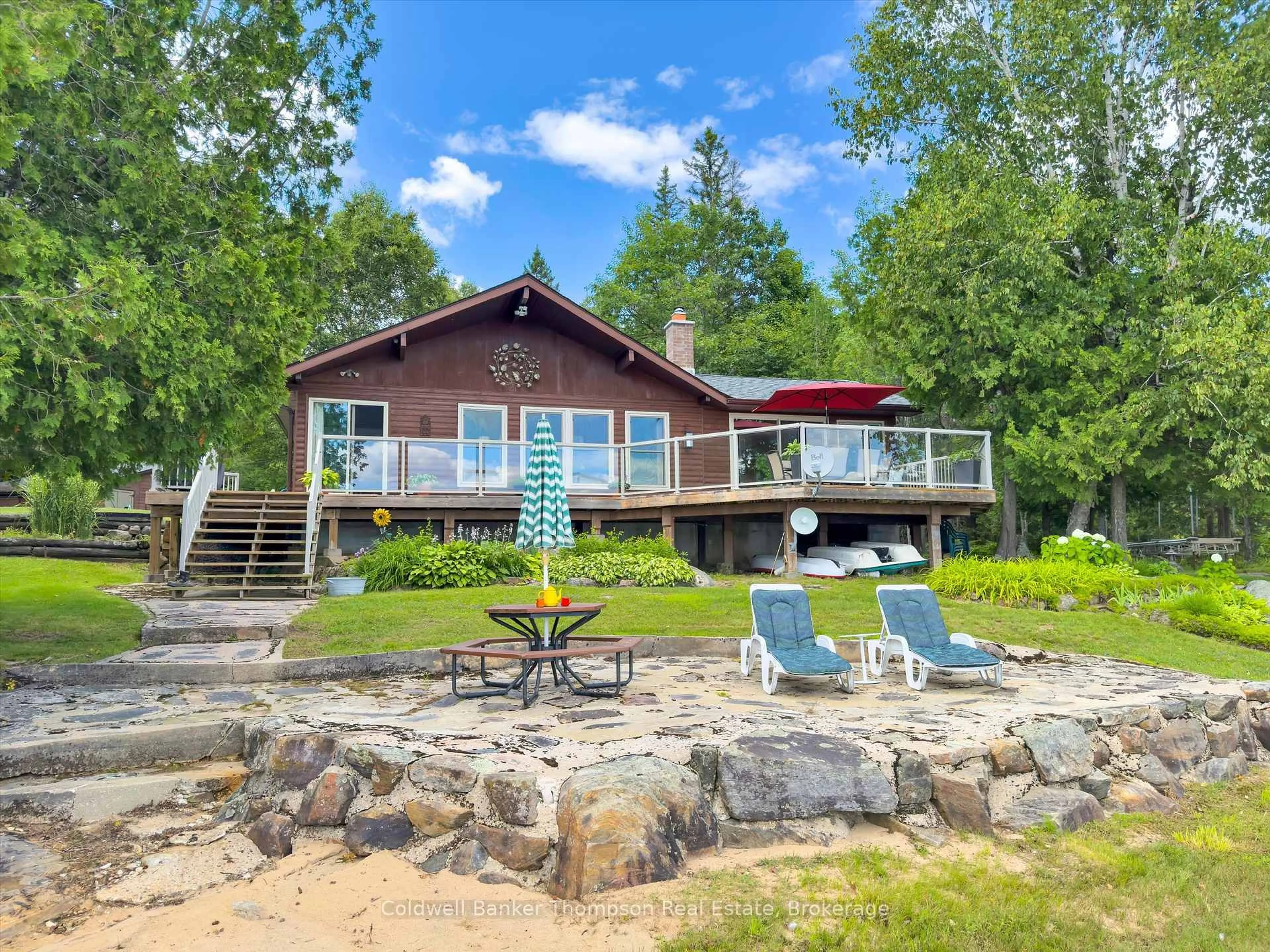A pic from outside/outdoor area/front of a property/back of a property/a pic from drone, water/lake/river/ocean view for 152 Clark Rd, Armour Ontario P0A 1C0