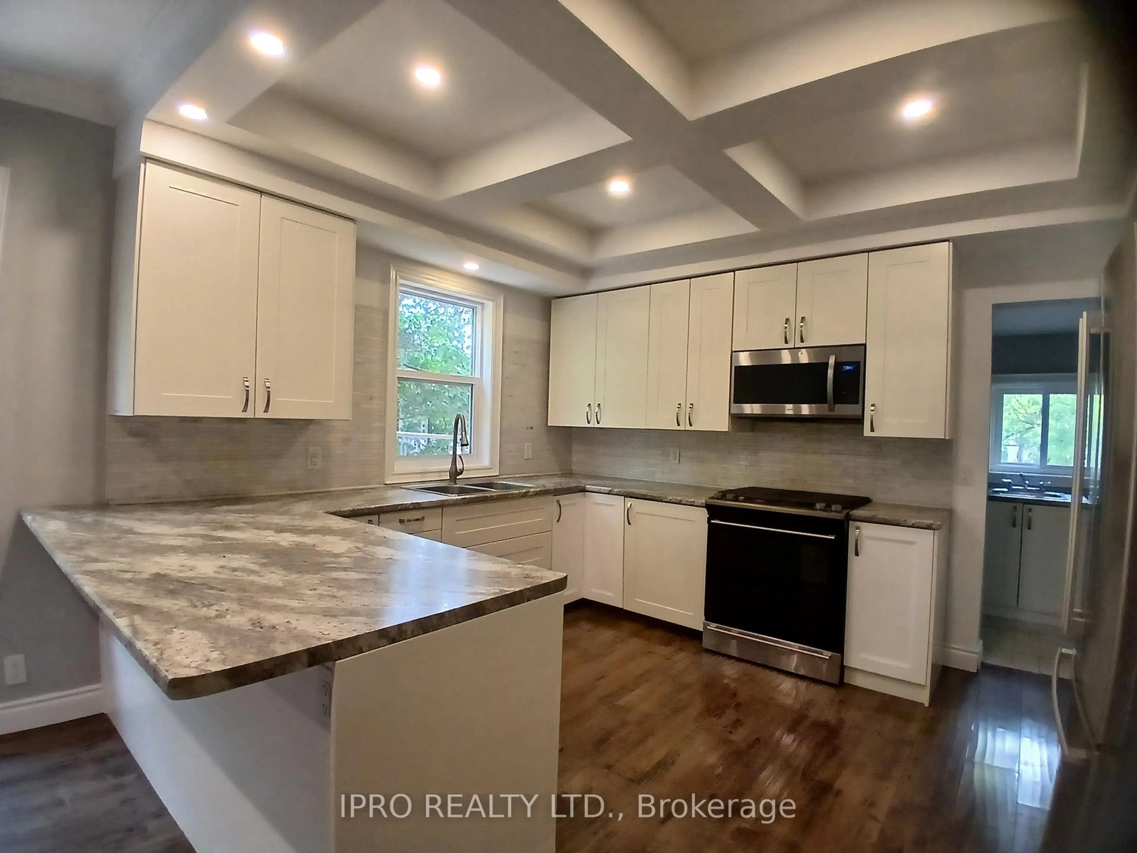 Open concept kitchen, unknown for 49 East 9th St, Hamilton Ontario L9A 3M6