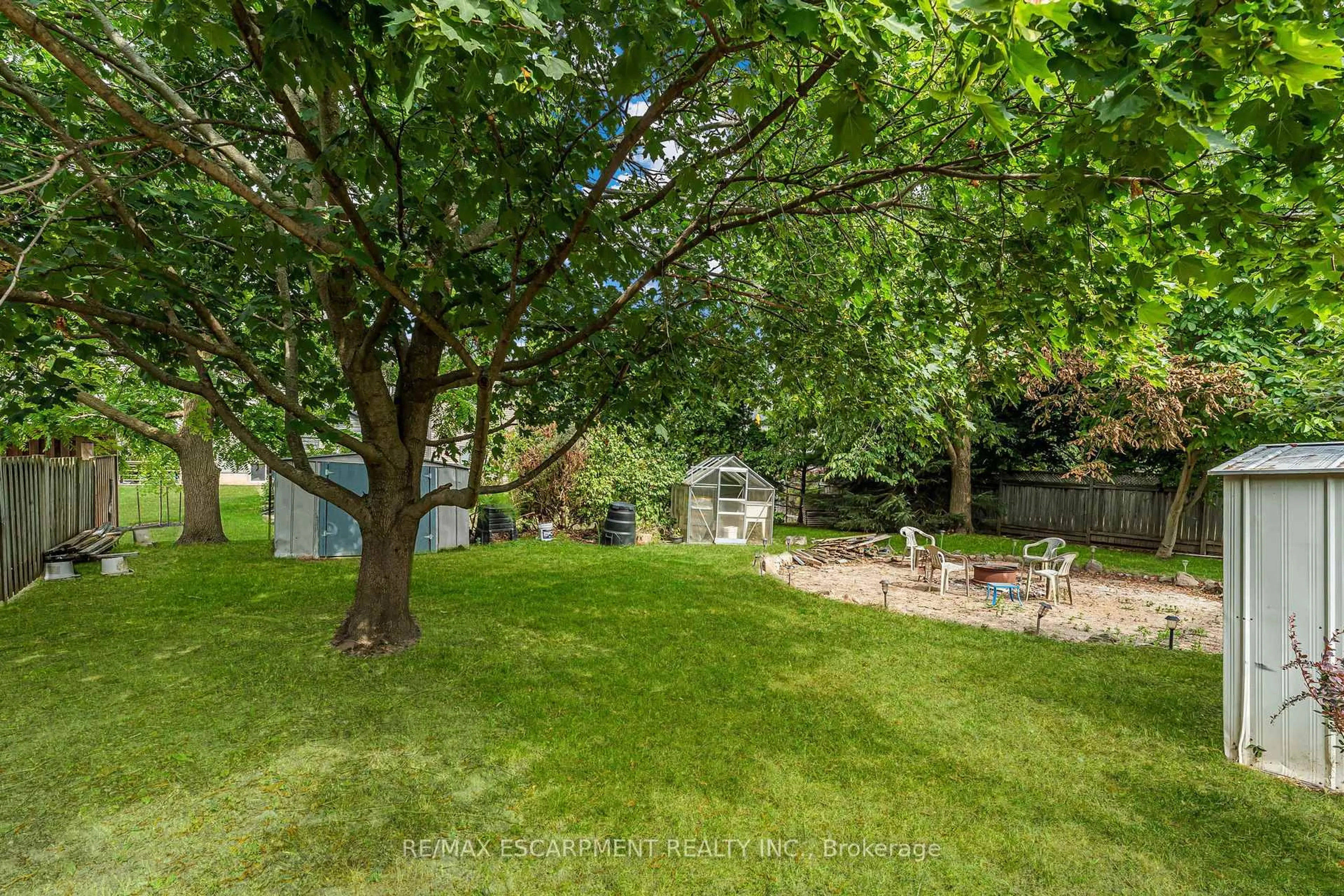 A pic from outside/outdoor area/front of a property/back of a property/a pic from drone, forest/trees view for 40 Wade Rd, West Lincoln Ontario L0R 2A0