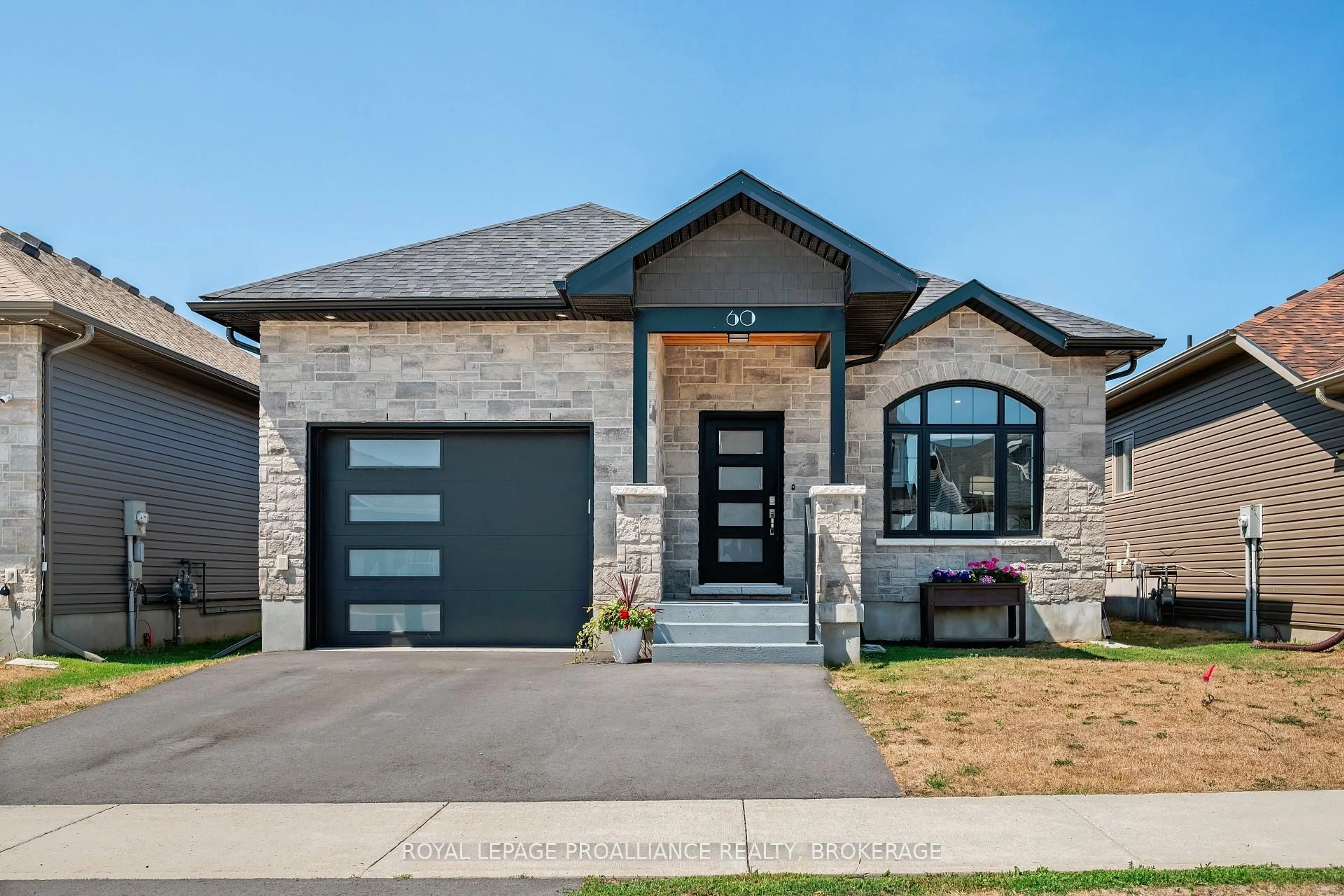 Home with brick exterior material, street for 60 Potter Dr, Bissett Creek Ontario K0H 2H0