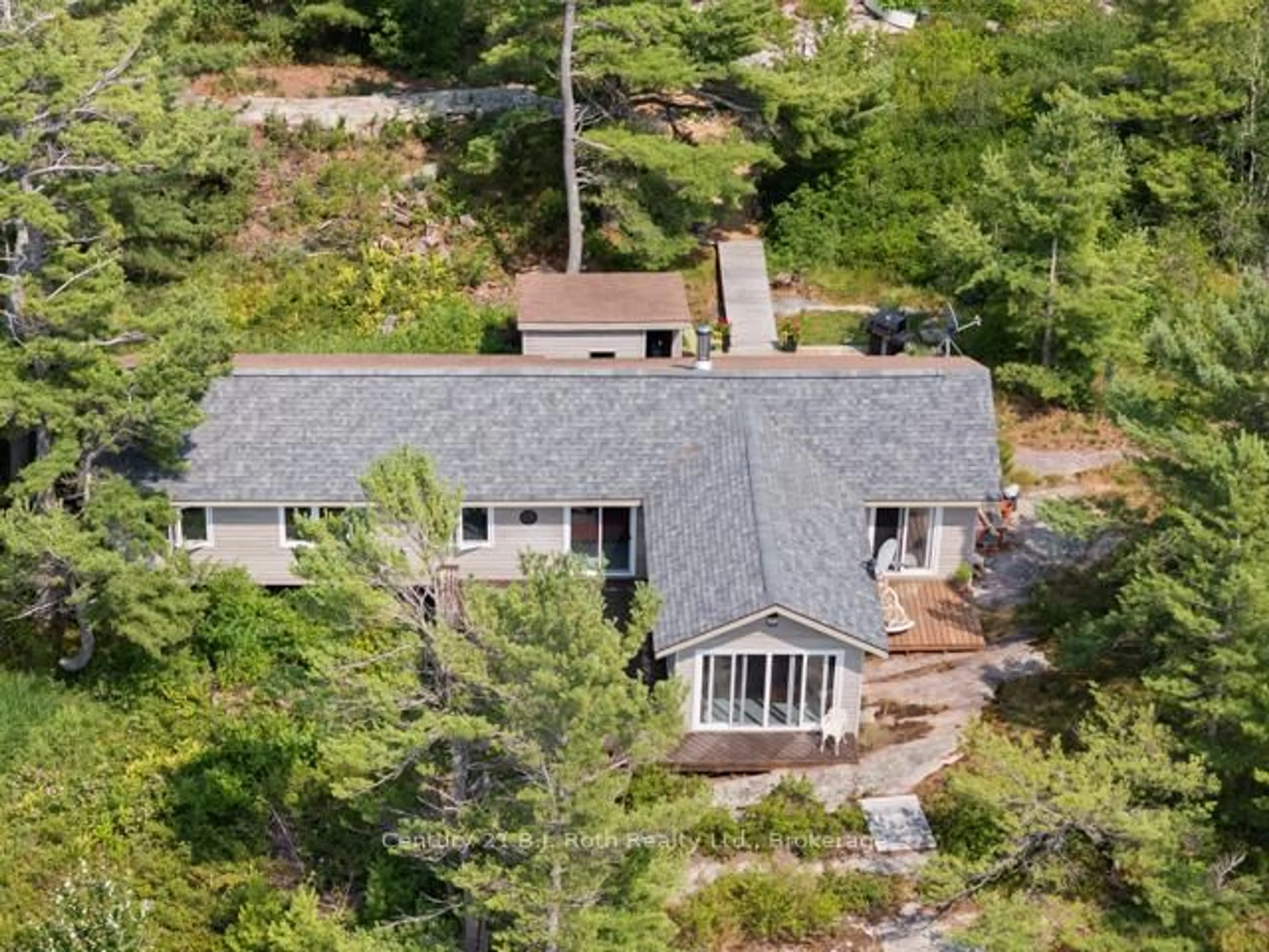 A pic from outside/outdoor area/front of a property/back of a property/a pic from drone, unknown for 1 252c Island, Carling Ontario P0G 1G0