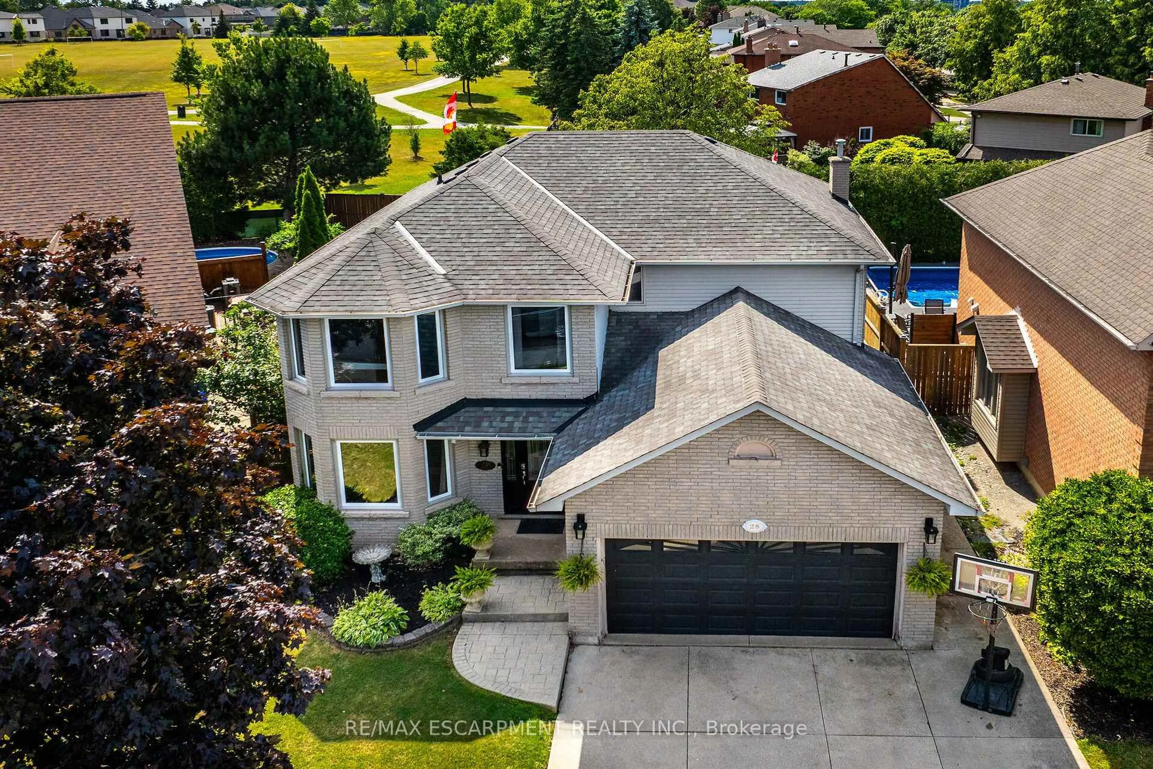 A pic from outside/outdoor area/front of a property/back of a property/a pic from drone, street for 28 DOLMAN St, Hamilton Ontario L8J 2P3