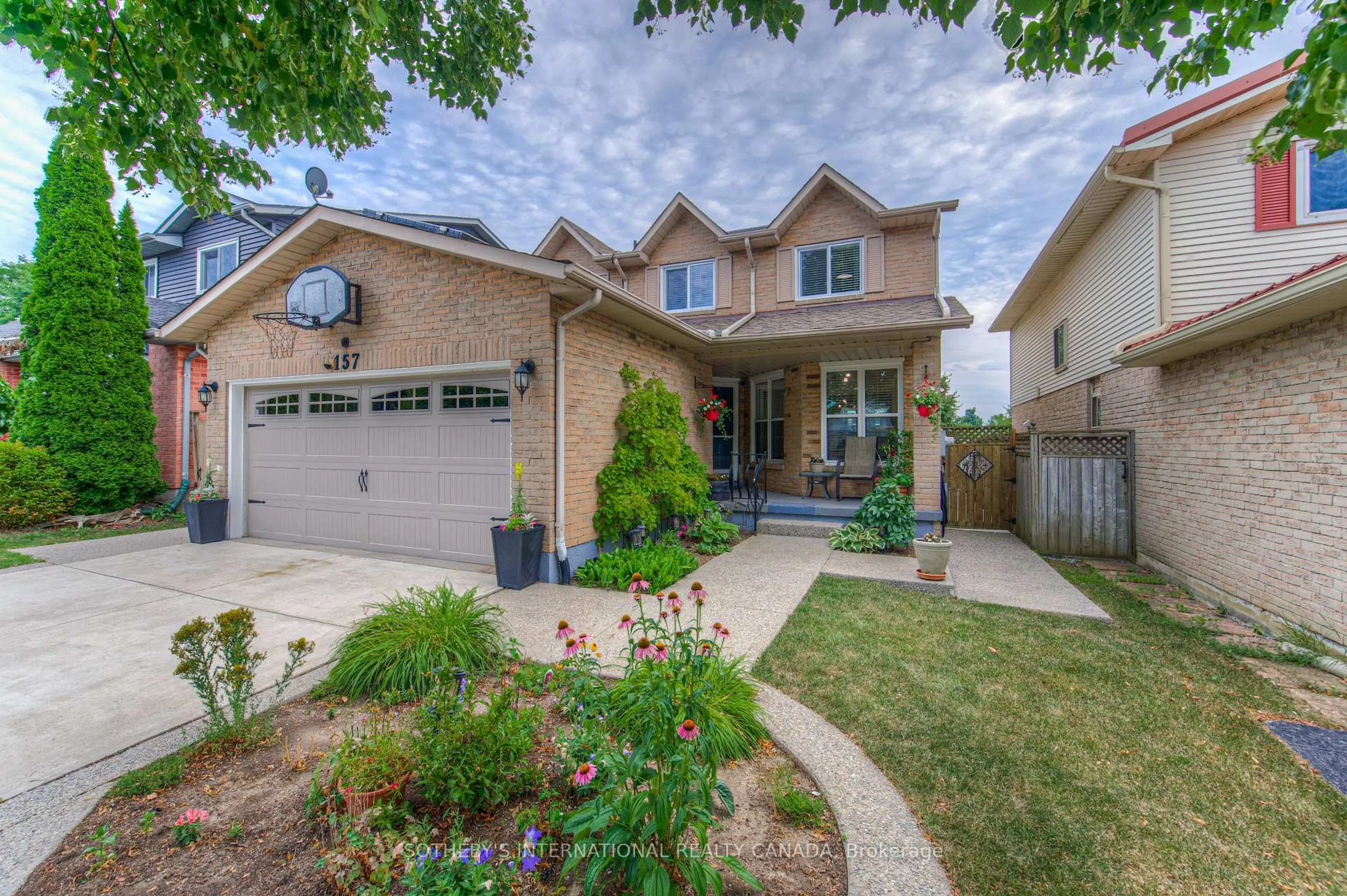 Home with brick exterior material, street for 157 Twin Cres, Hamilton Ontario L8W 3A7