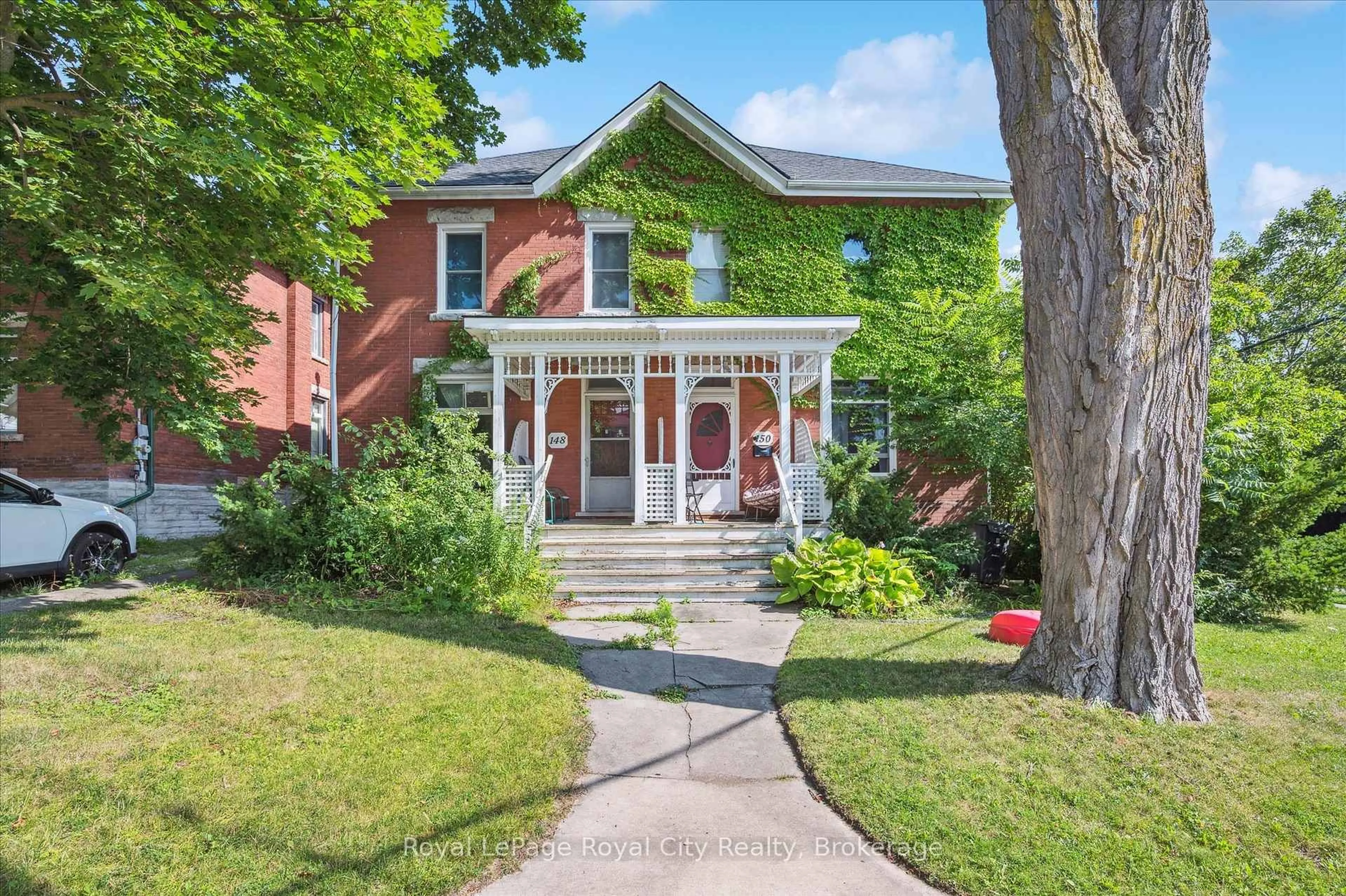 Home with brick exterior material, street for 148 Suffolk St, Guelph Ontario N1H 2J5