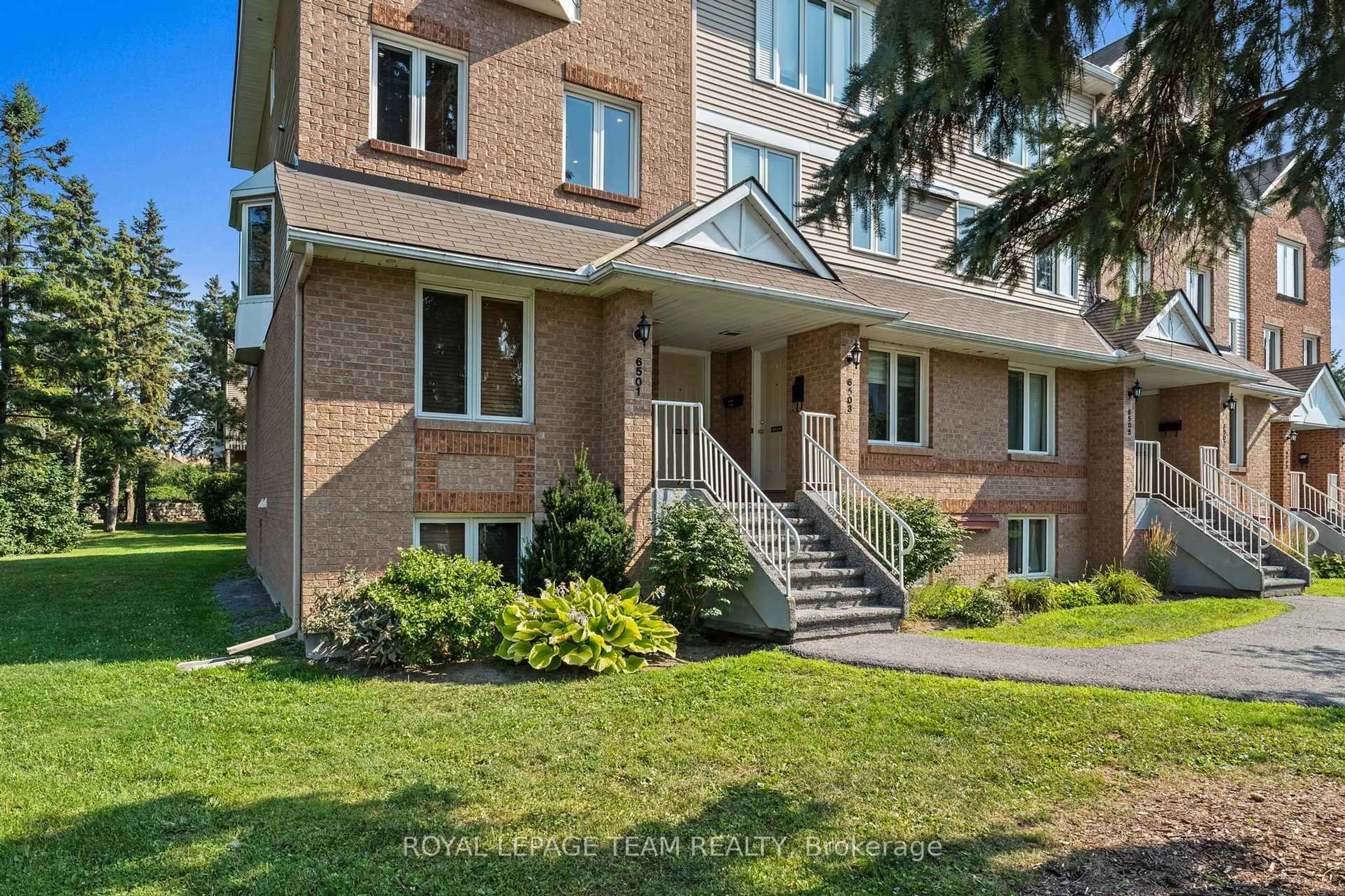 Home with brick exterior material, street for 6501 Bilberry Dr #B, Ottawa Ontario K1C 4N4