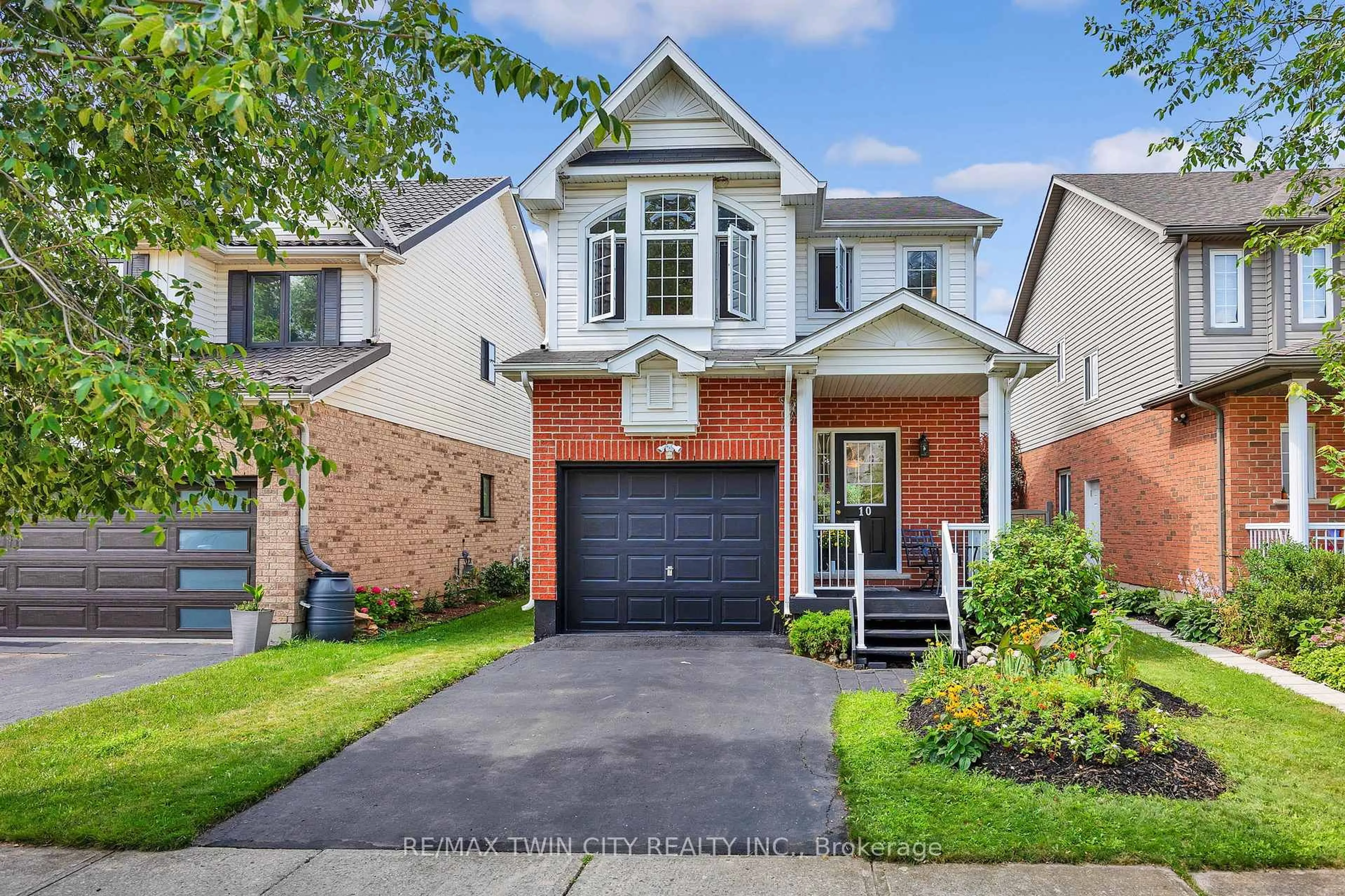 Home with brick exterior material, street for 10 Ivy Lane Crt, Kitchener Ontario N2N 3P8