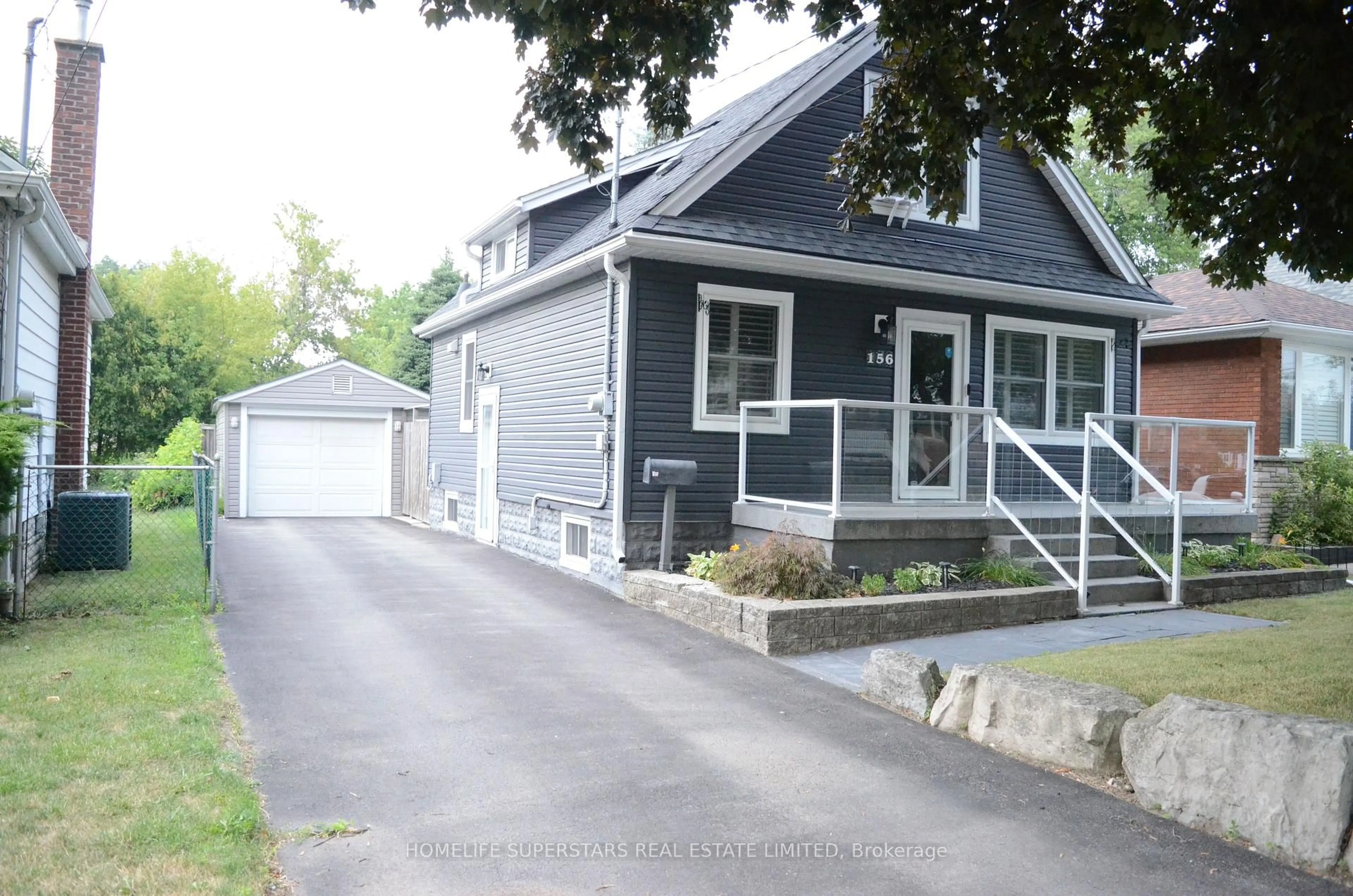 Home with vinyl exterior material, street for 156 East 21st St, Hamilton Ontario L8V 2T4