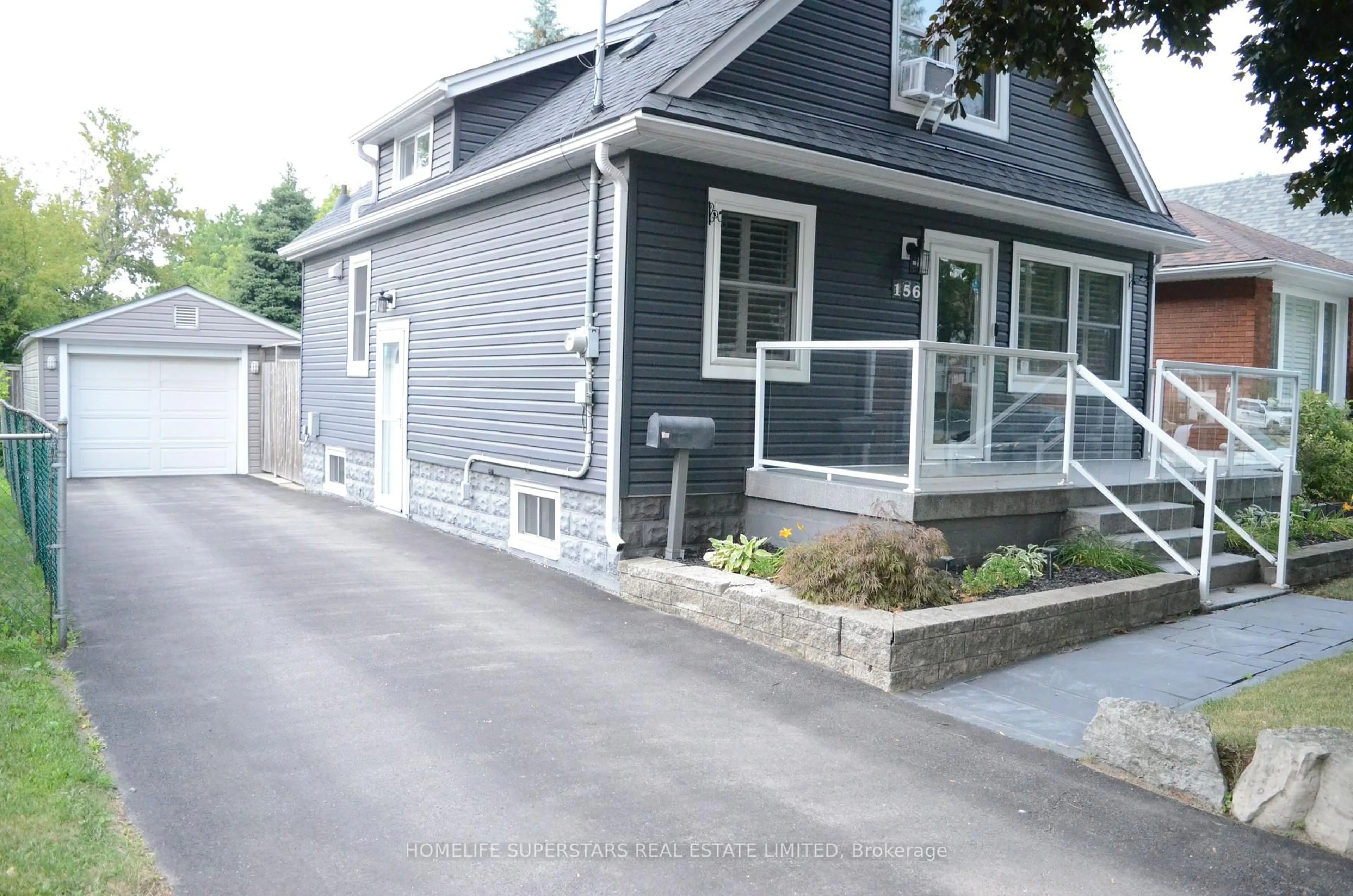 Home with vinyl exterior material, street for 156 East 21st St, Hamilton Ontario L8V 2T4
