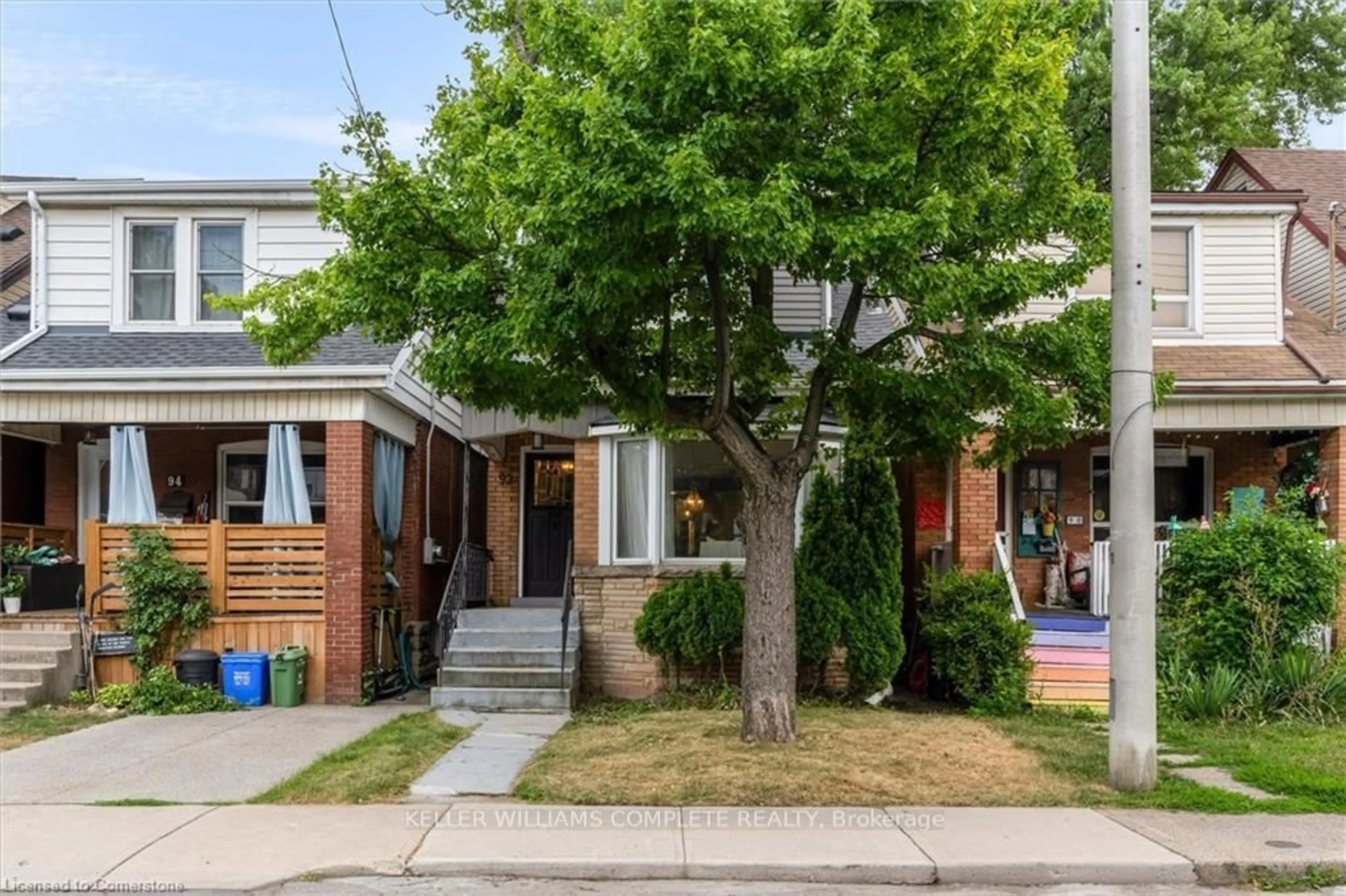 Home with brick exterior material, street for 92 Kensington Ave, Hamilton Ontario L8L 7N2