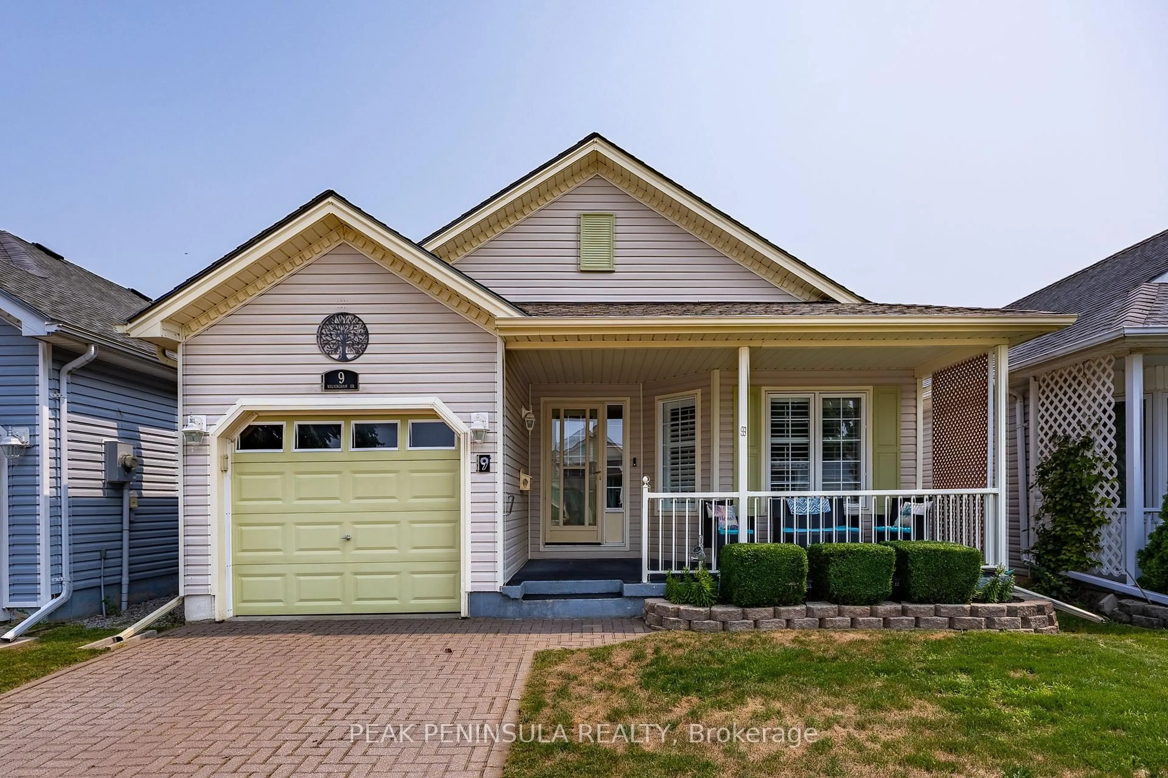 Home with vinyl exterior material, street for 9 Walsingham Dr, Norfolk Ontario N0E 1M0