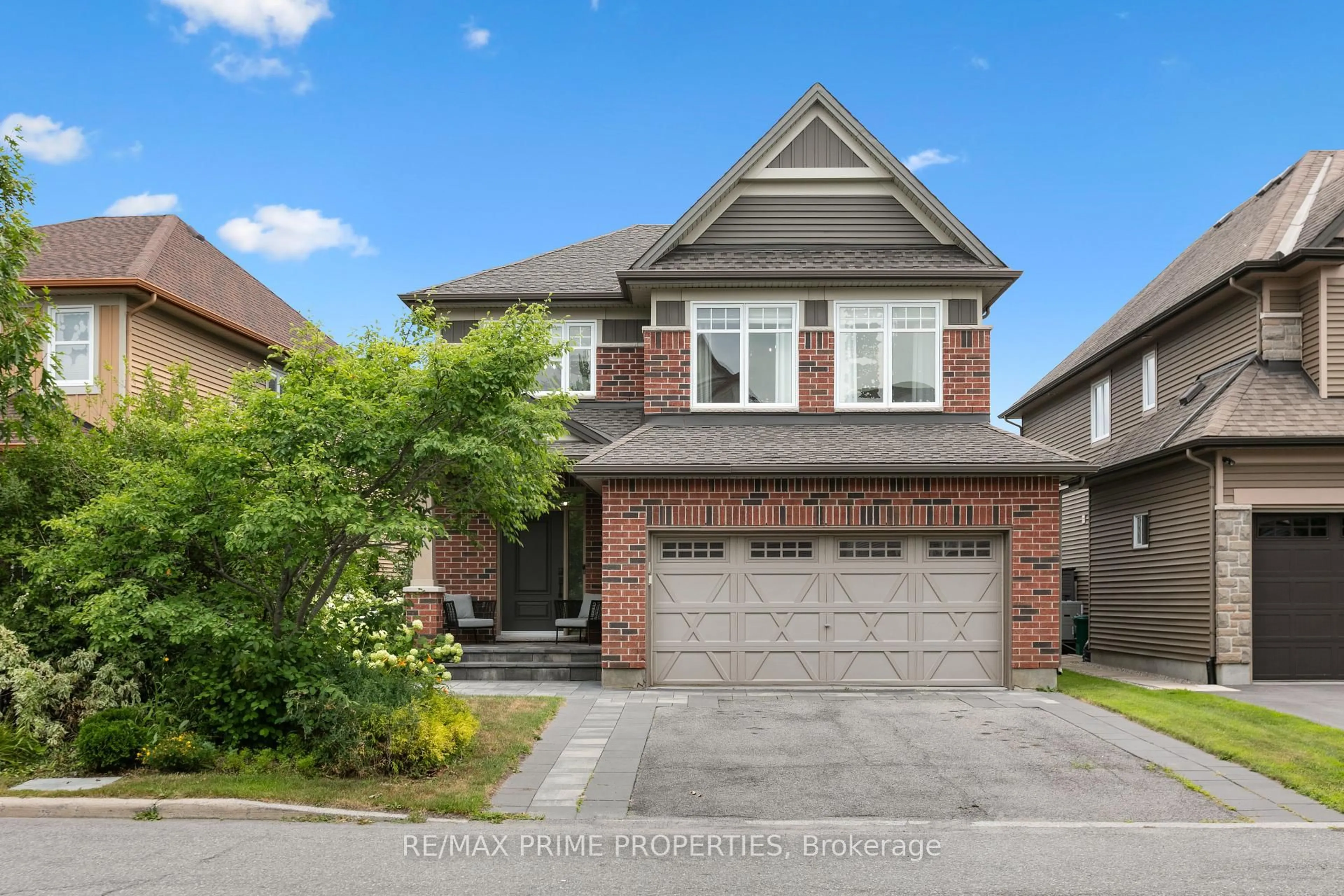 Home with brick exterior material, street for 526 Golden Sedge Way, Ottawa Ontario K1T 0G3