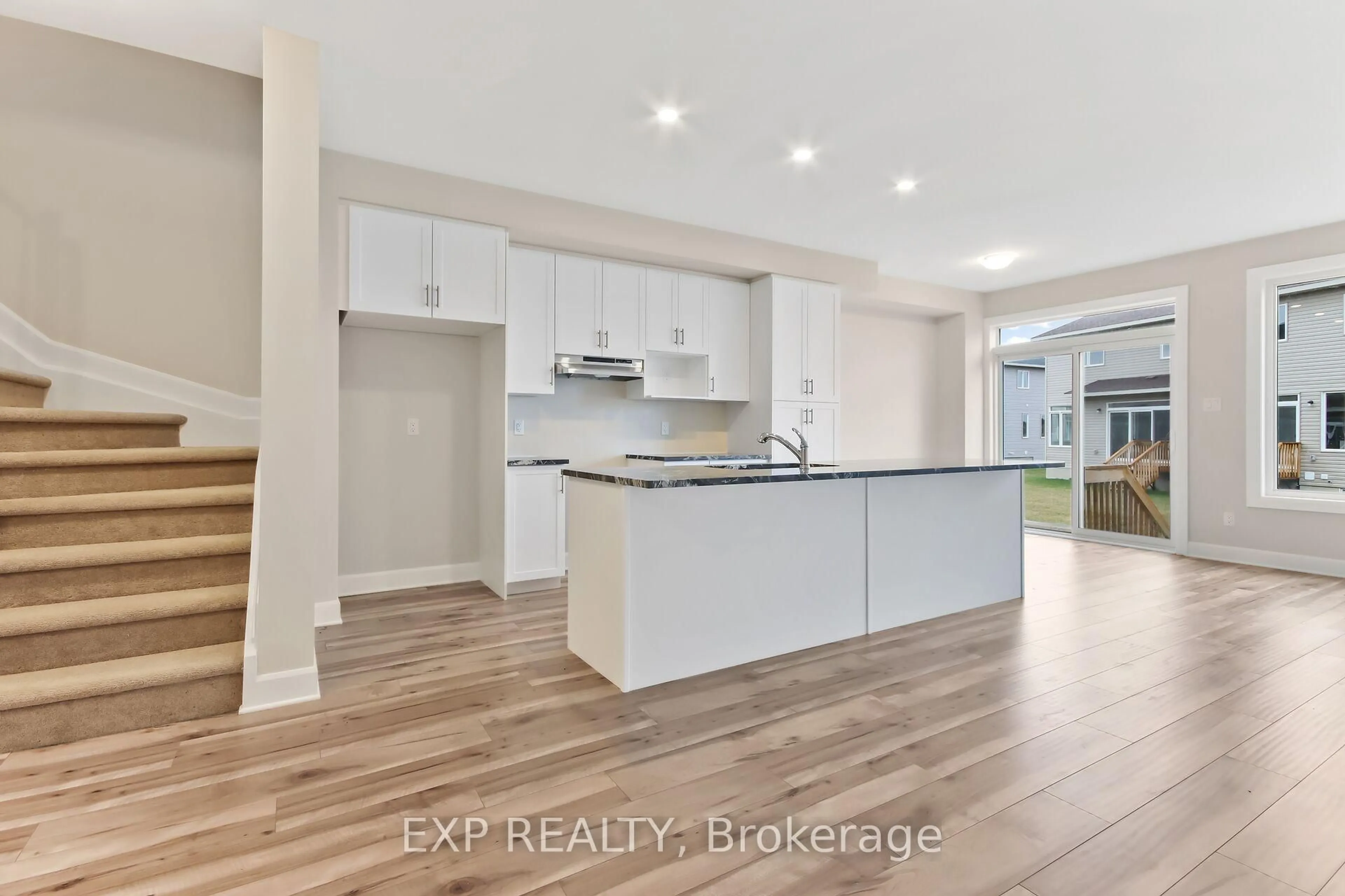 Open concept kitchen, wood/laminate floor for 213 HOOPER St, Carleton Place Ontario K7C 0C4