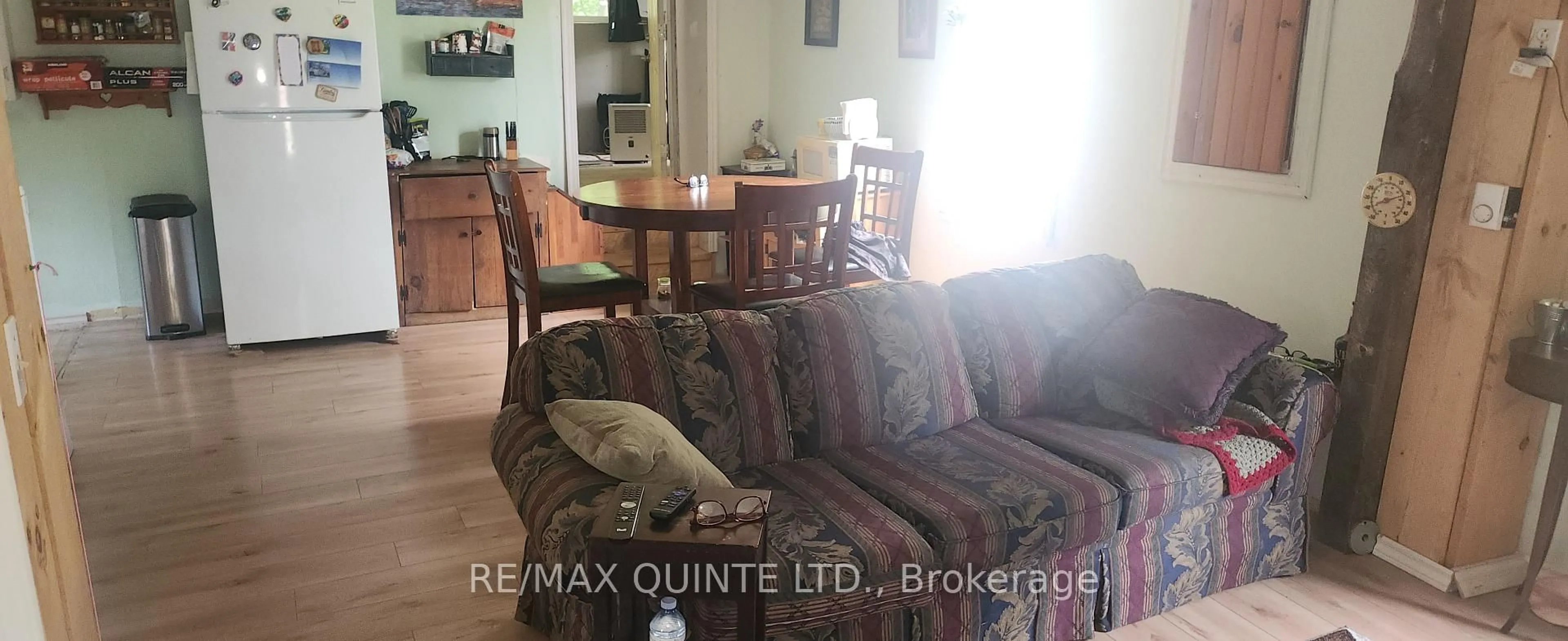 Living room with furniture, wood/laminate floor for 305 Moneymore Rd, Belleville Ontario K0K 2Y0