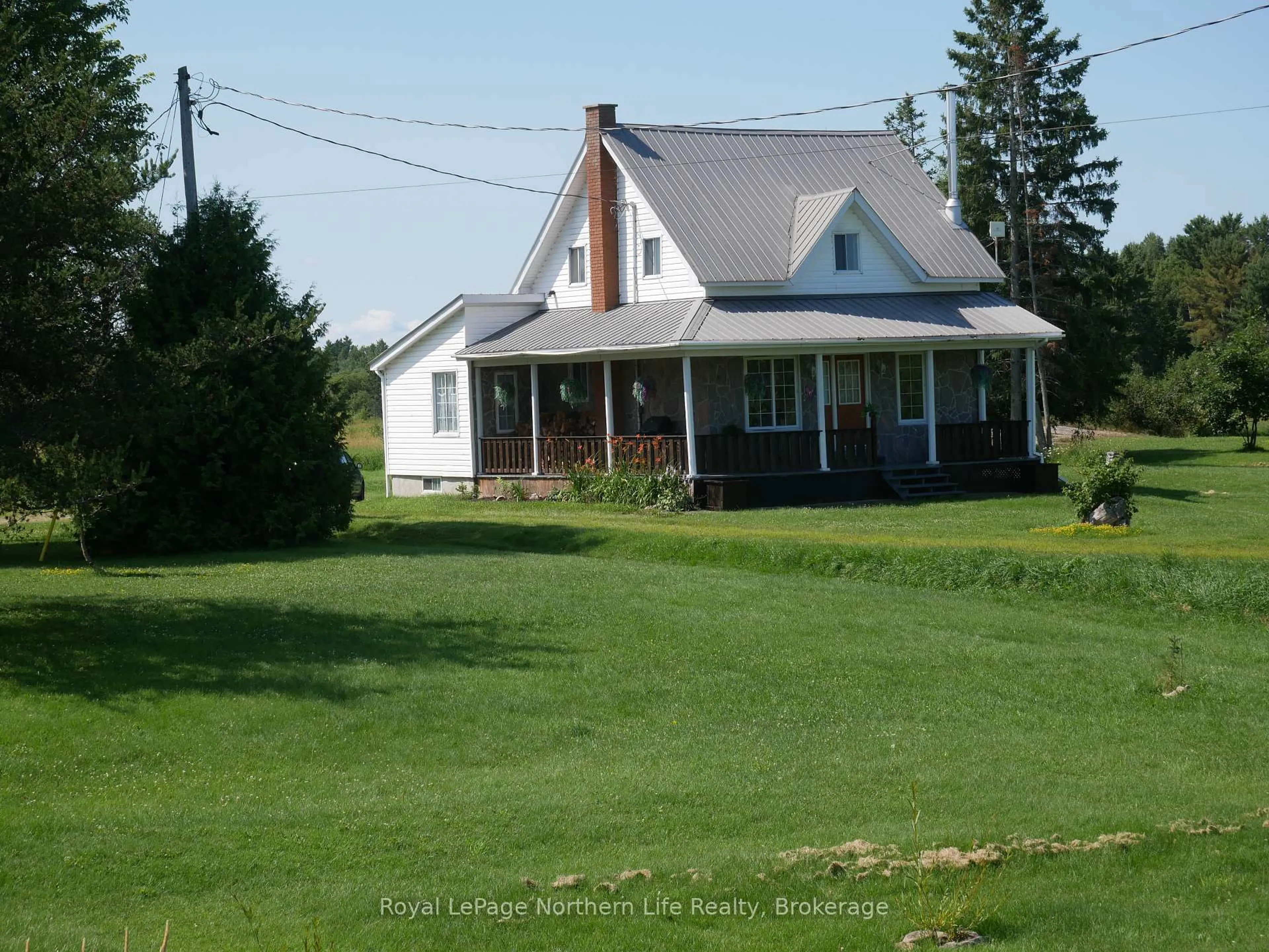 A pic from outside/outdoor area/front of a property/back of a property/a pic from drone, street for 10180 Highway 64, West Nipissing Ontario P0H 1R0