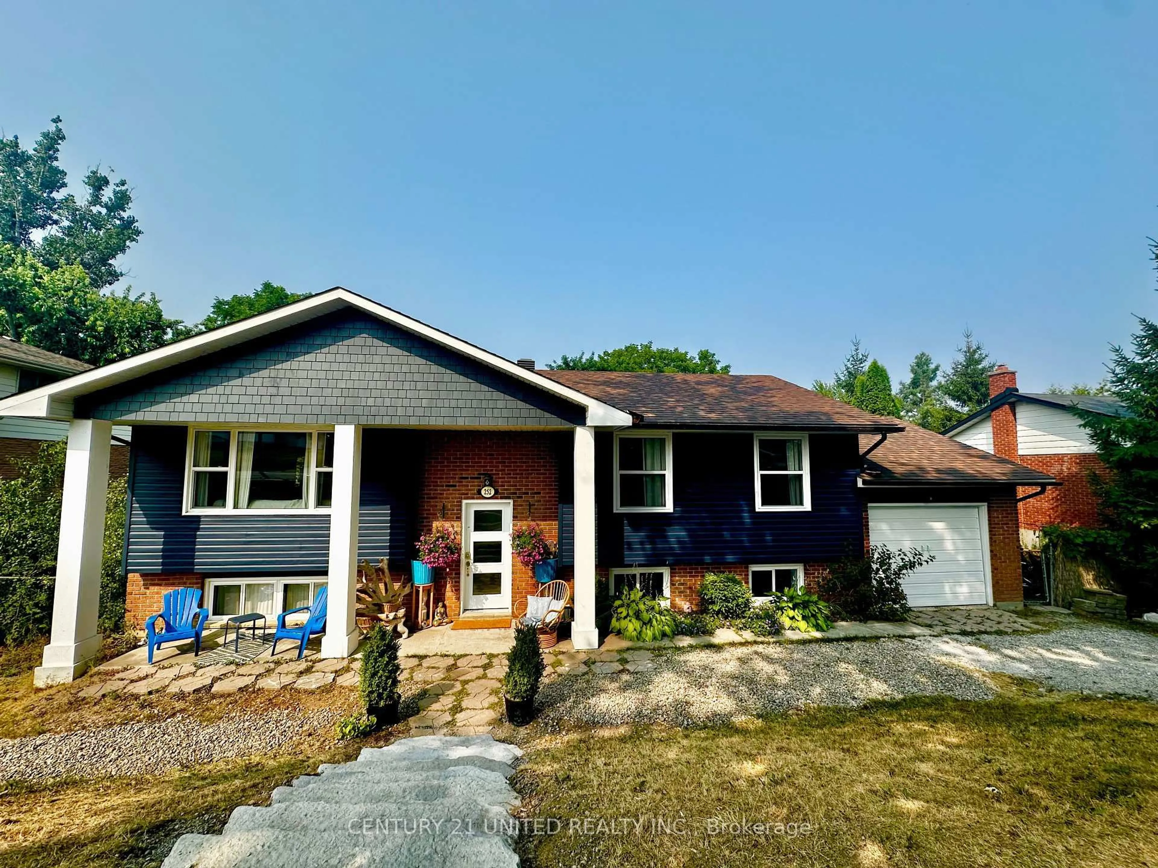Home with brick exterior material, street for 252 Queen St, Selwyn Ontario K0L 2H0