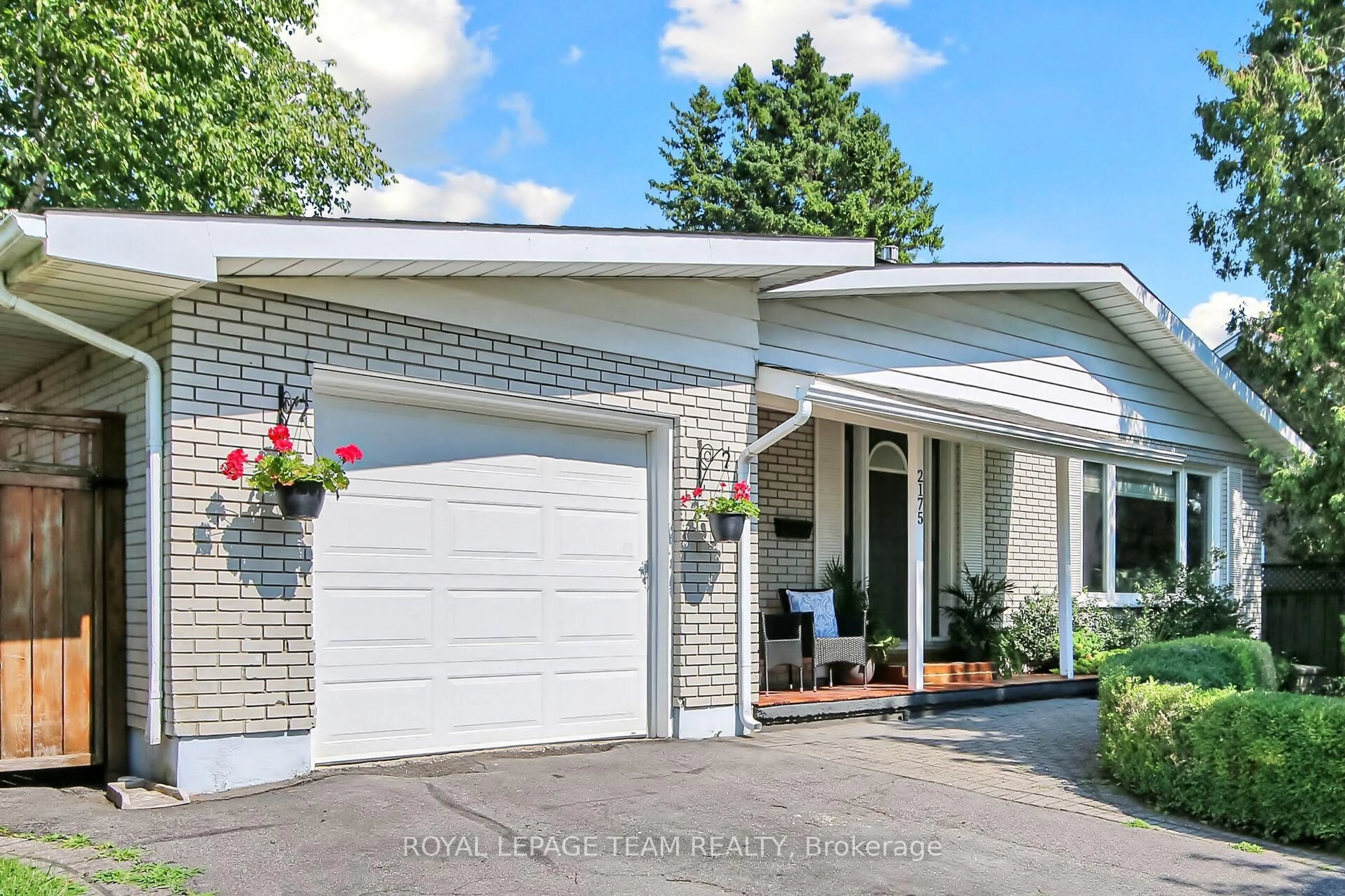 Home with brick exterior material, street for 2175 Audrey Ave, Ottawa Ontario K1G 1L1