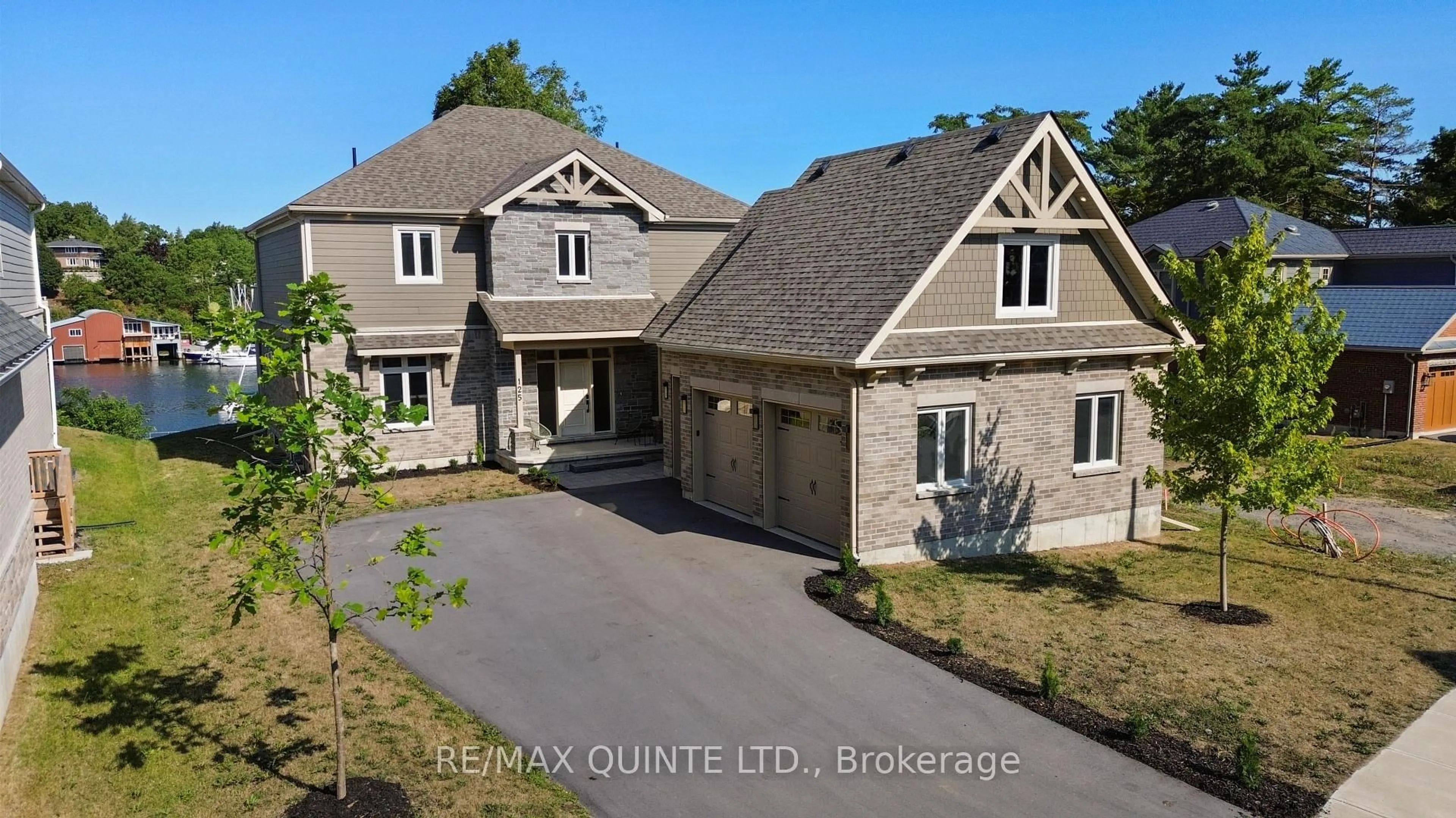 Home with brick exterior material, street for 125 Villeneuve Dr, Prince Edward County Ontario K0K 2T0