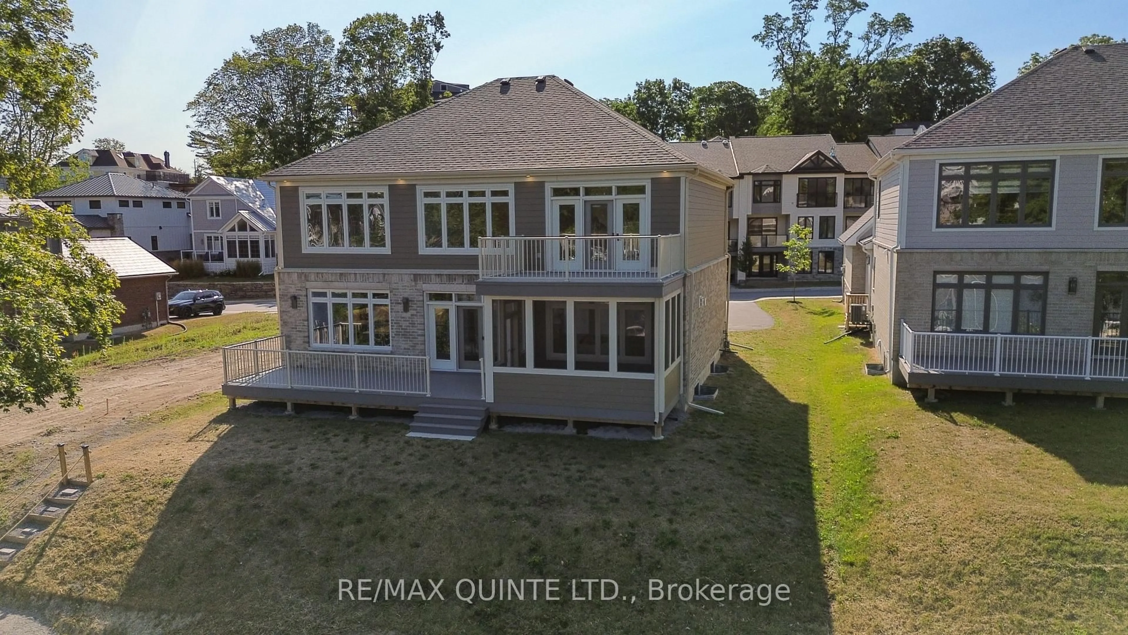 A pic from outside/outdoor area/front of a property/back of a property/a pic from drone, water/lake/river/ocean view for 125 Villeneuve Dr, Prince Edward County Ontario K0K 2T0