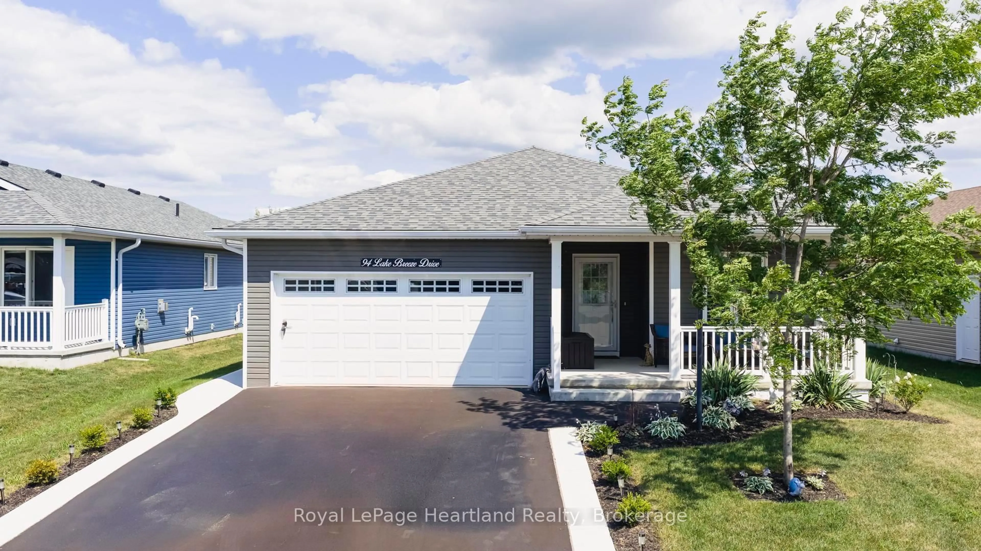Home with vinyl exterior material, street for 94 Lake Breeze Dr, Ashfield-Colborne-Wawanosh Ontario N7A 0B9