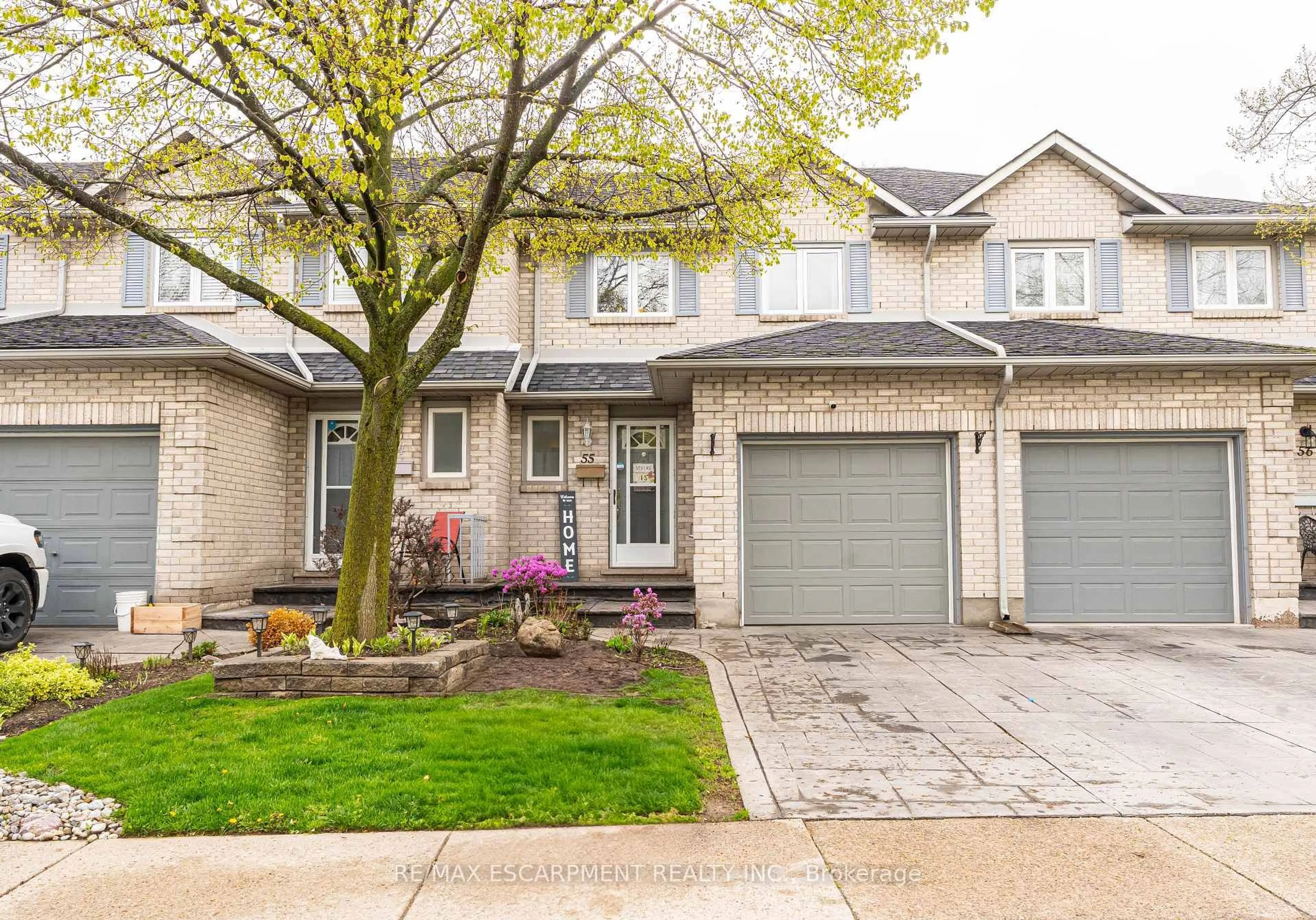 Home with brick exterior material, street for 1 Royalwood Crt #55, Hamilton Ontario L8E 4Y2