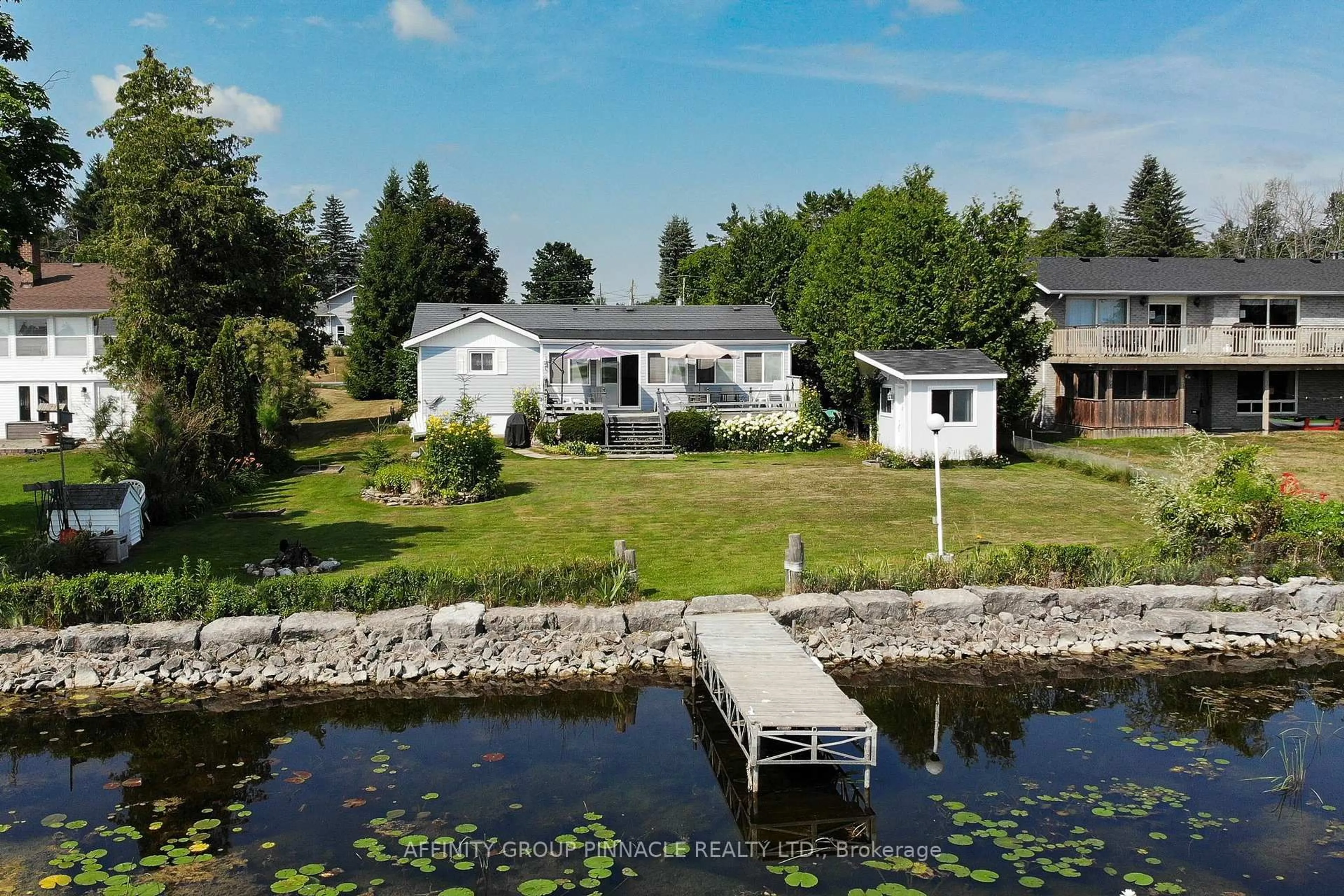 A pic from outside/outdoor area/front of a property/back of a property/a pic from drone, water/lake/river/ocean view for 11 Lakeview Cres, Kawartha Lakes Ontario K0M 1A0