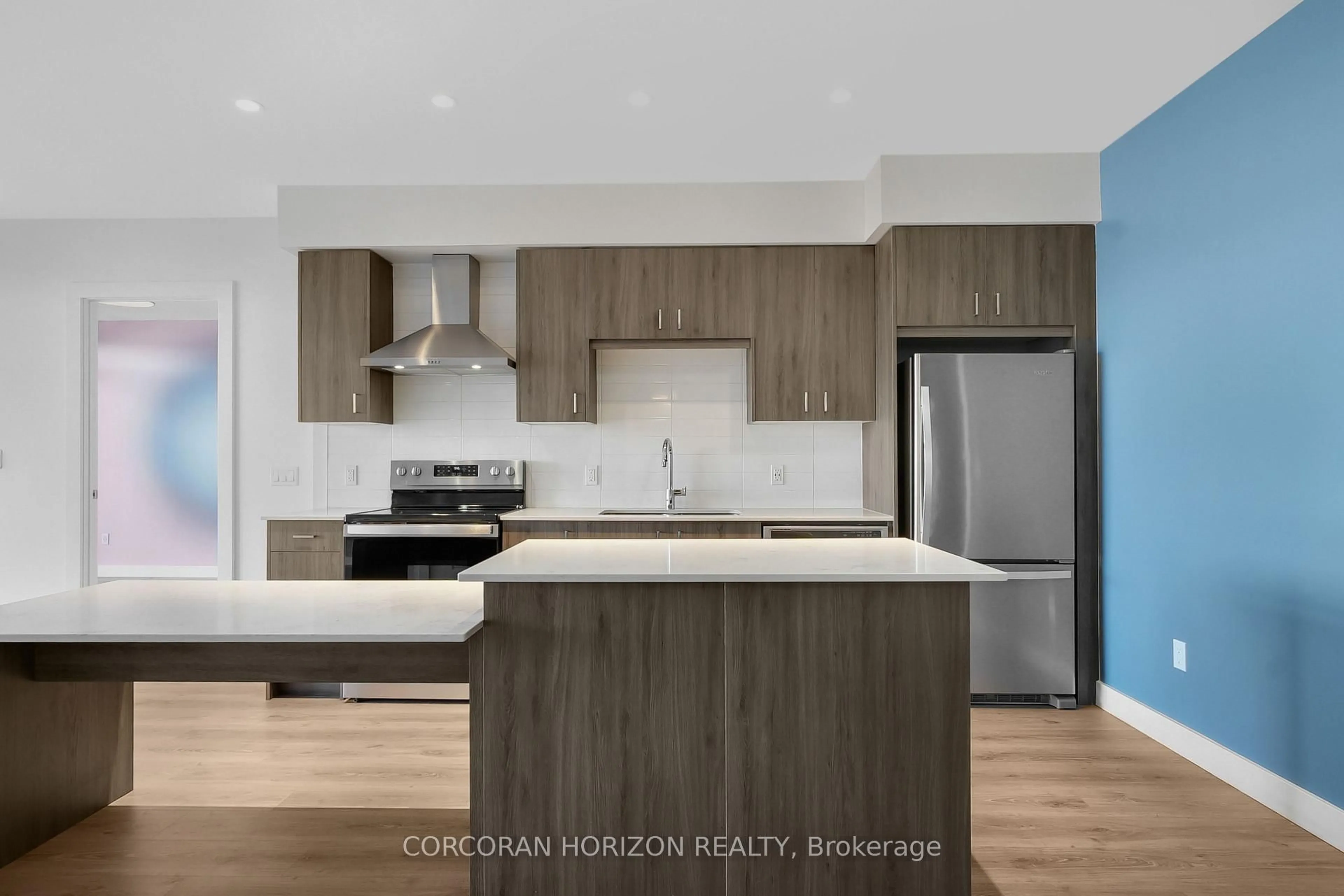 Open concept kitchen, wood/laminate floor for 15 Glebe St #710, Cambridge Ontario N1S 0C3