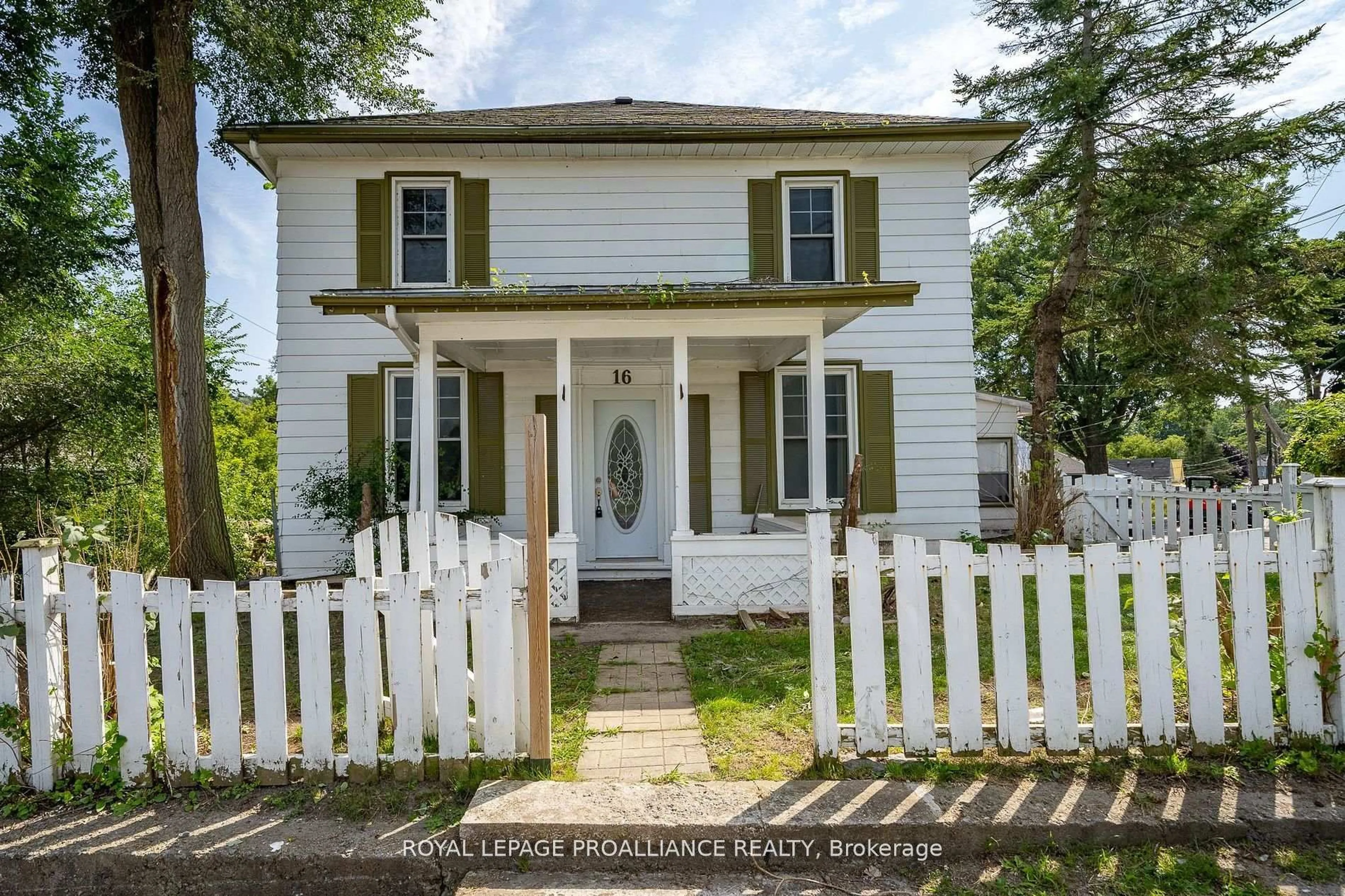Home with vinyl exterior material, street for 16 Bridge St, Prince Edward County Ontario K0K 2T0