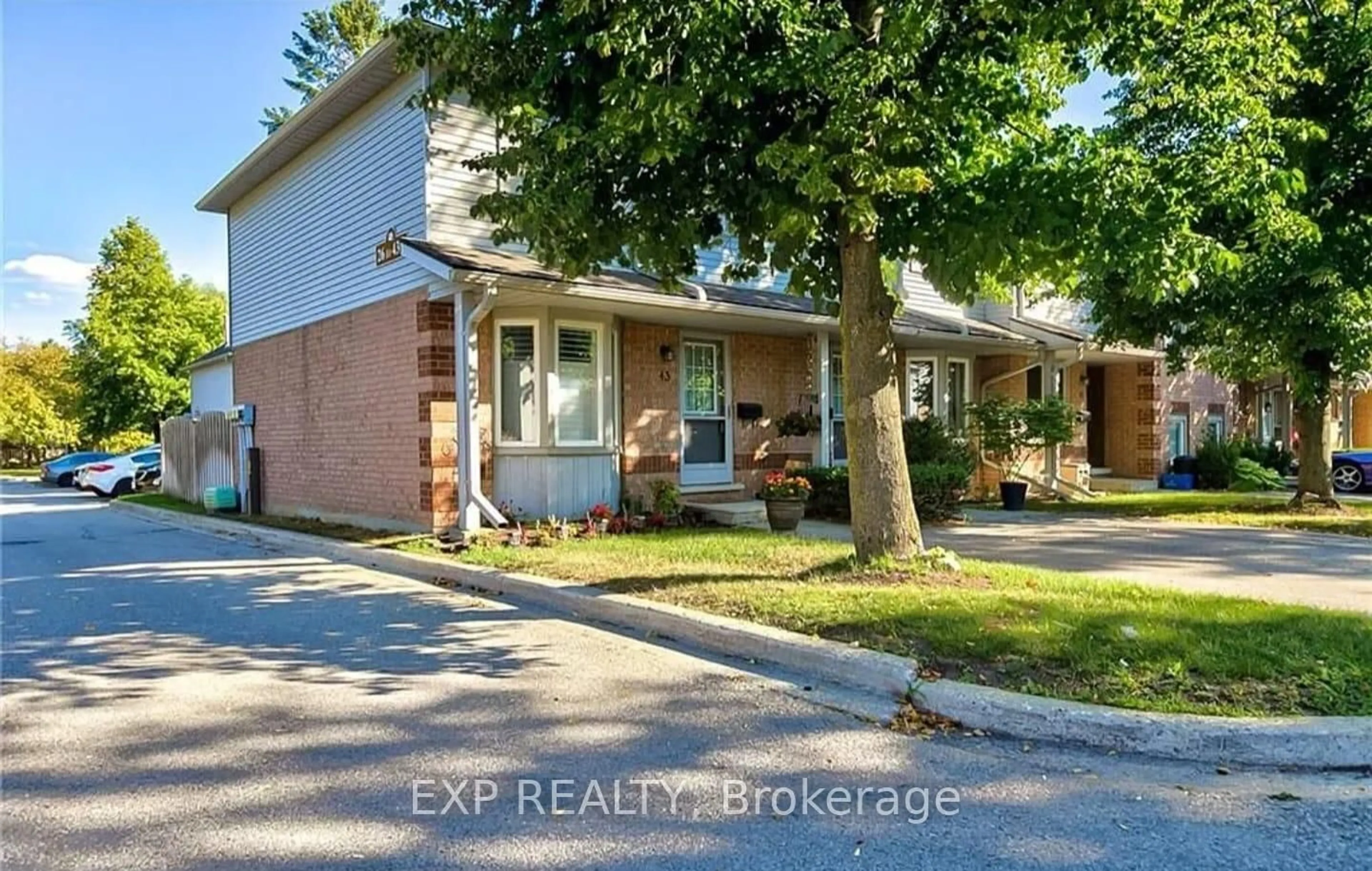 Home with brick exterior material, street for 180 Marksam Rd #43, Guelph Ontario N1H 8G5