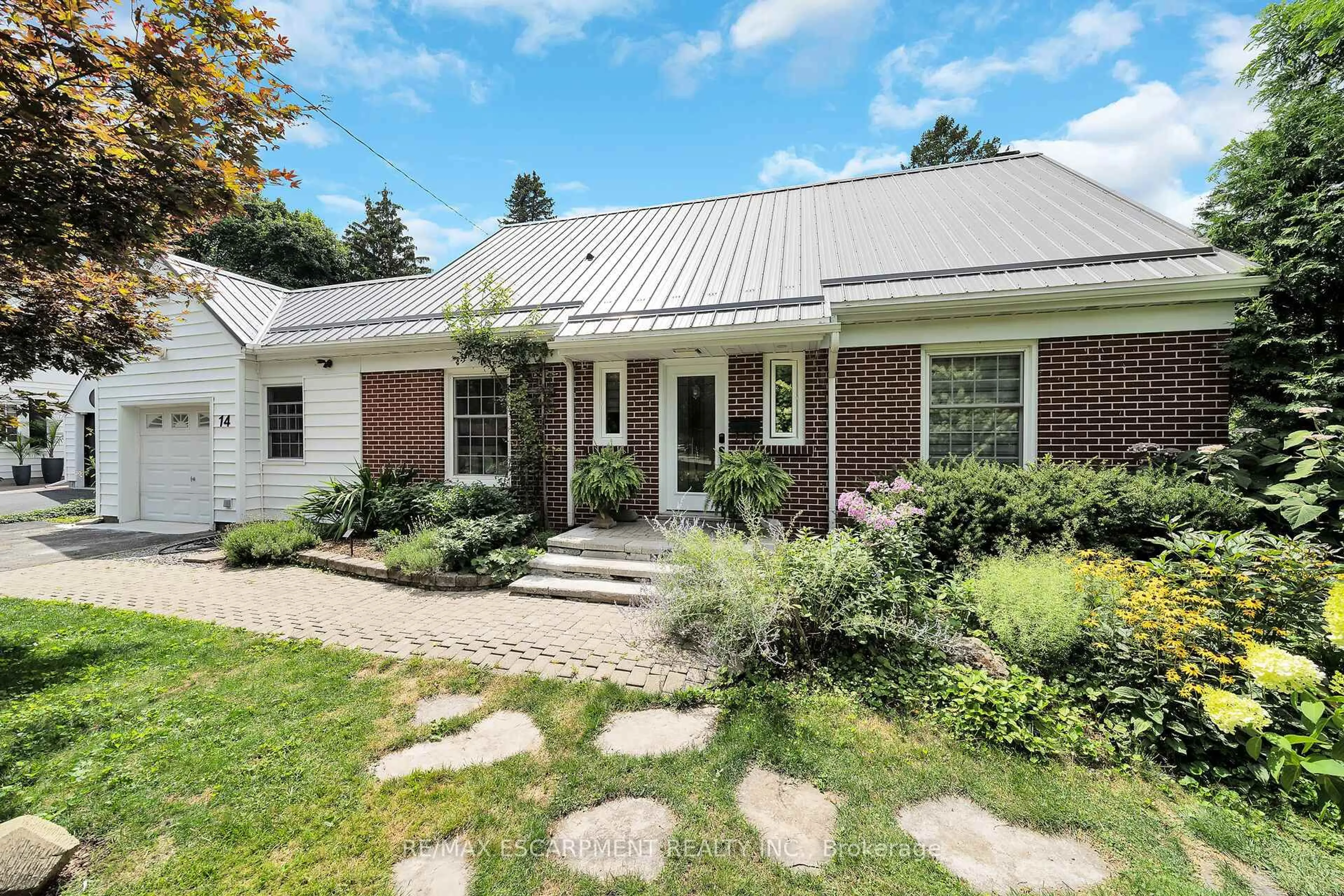 Home with brick exterior material, street for 14 SIMCOE Blvd, Norfolk Ontario N3Y 3L5