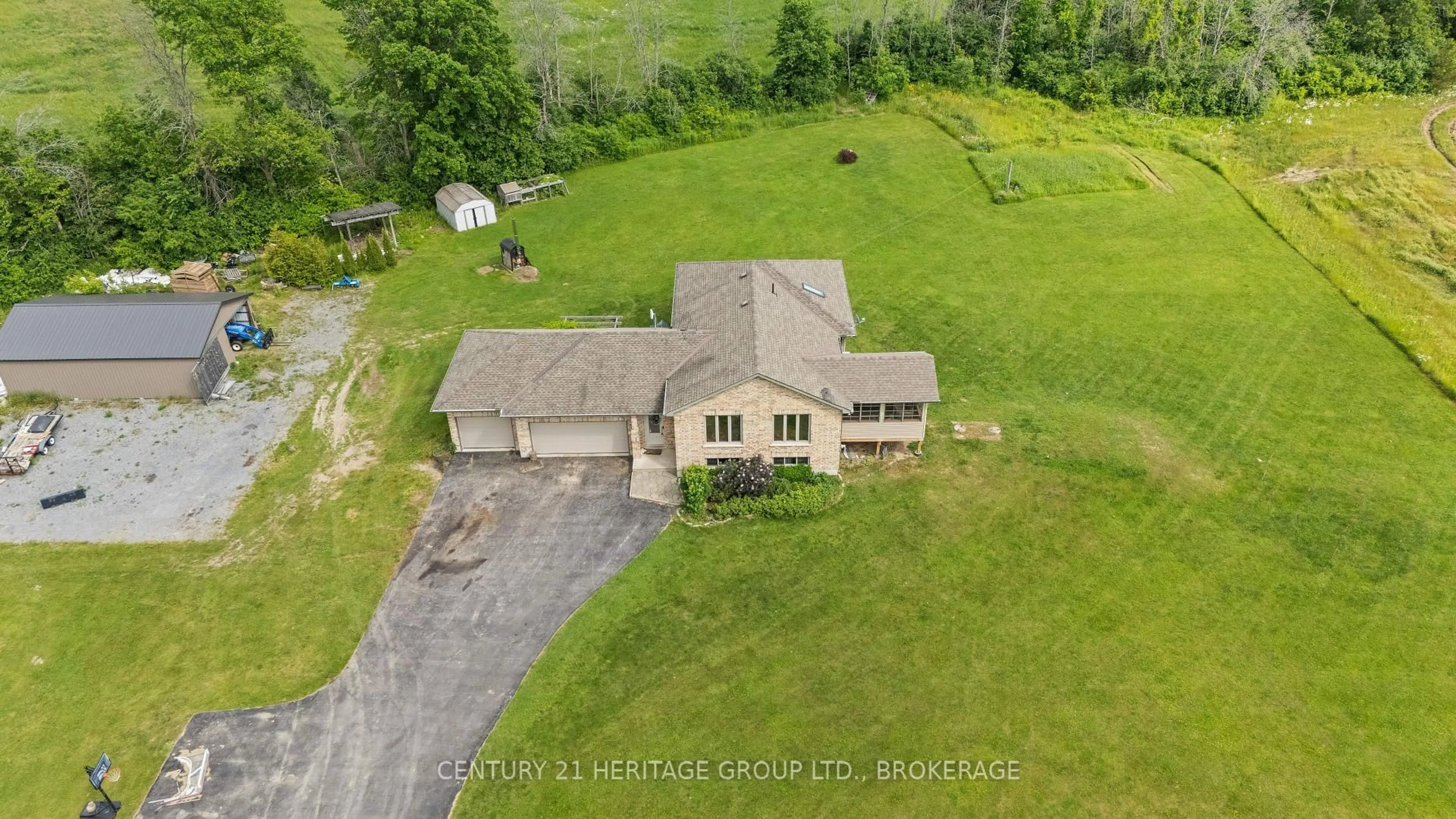 A pic from outside/outdoor area/front of a property/back of a property/a pic from drone, unknown for 3414 Wilton Rd, Harrowsmith Ontario K0H 1V0