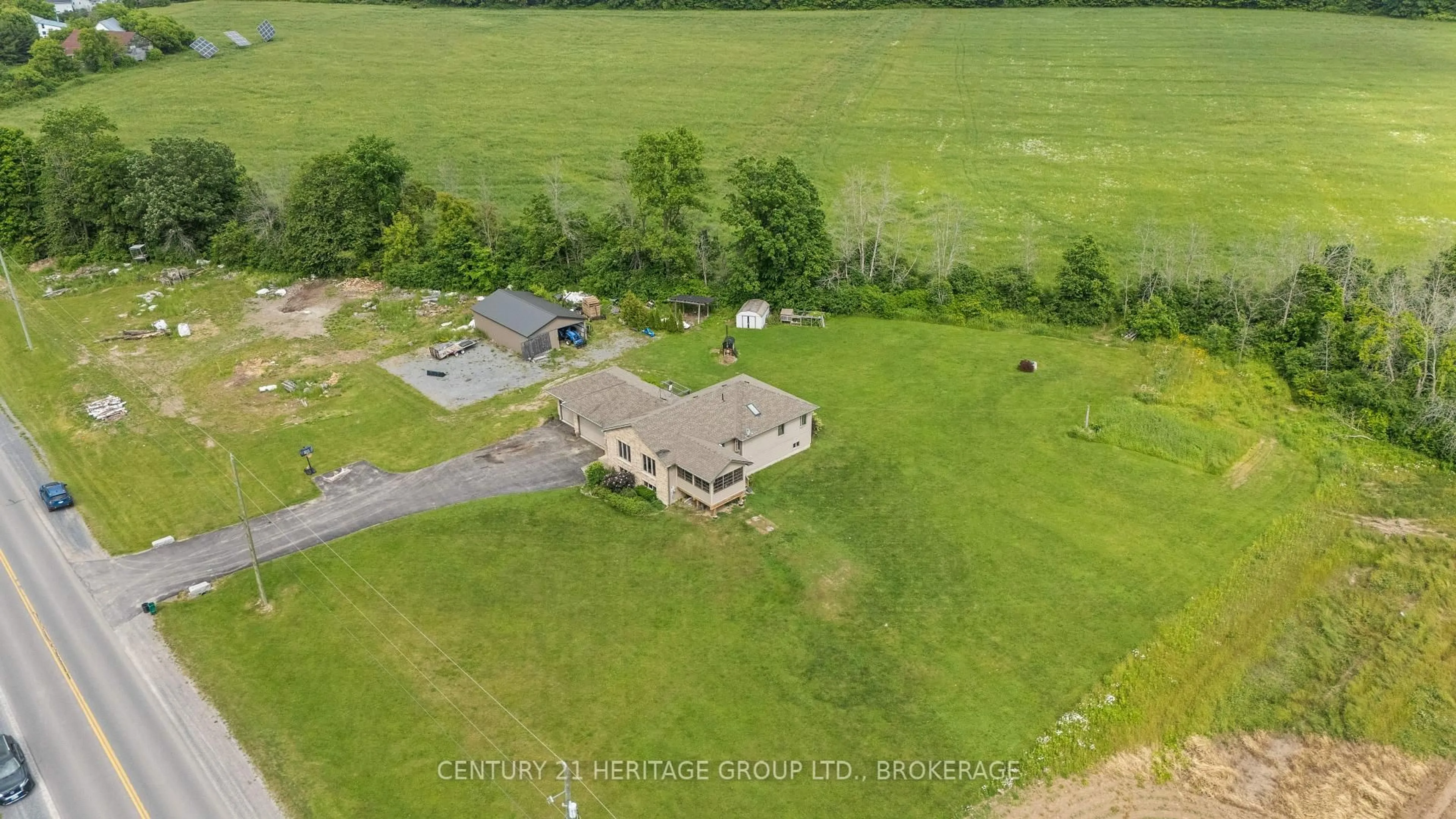 A pic from outside/outdoor area/front of a property/back of a property/a pic from drone, building for 3414 Wilton Rd, Harrowsmith Ontario K0H 1V0
