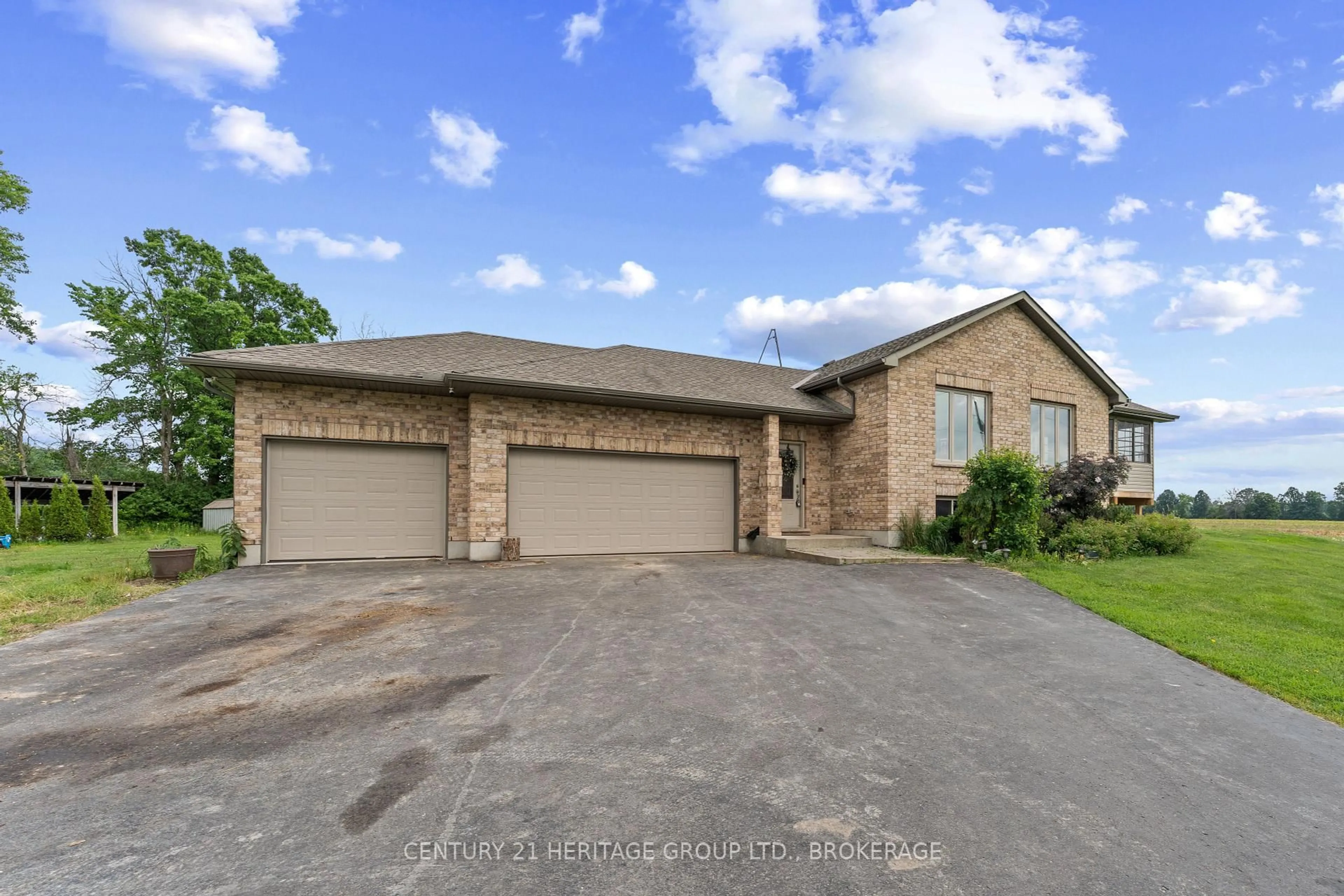 A pic from outside/outdoor area/front of a property/back of a property/a pic from drone, street for 3414 Wilton Rd, Harrowsmith Ontario K0H 1V0