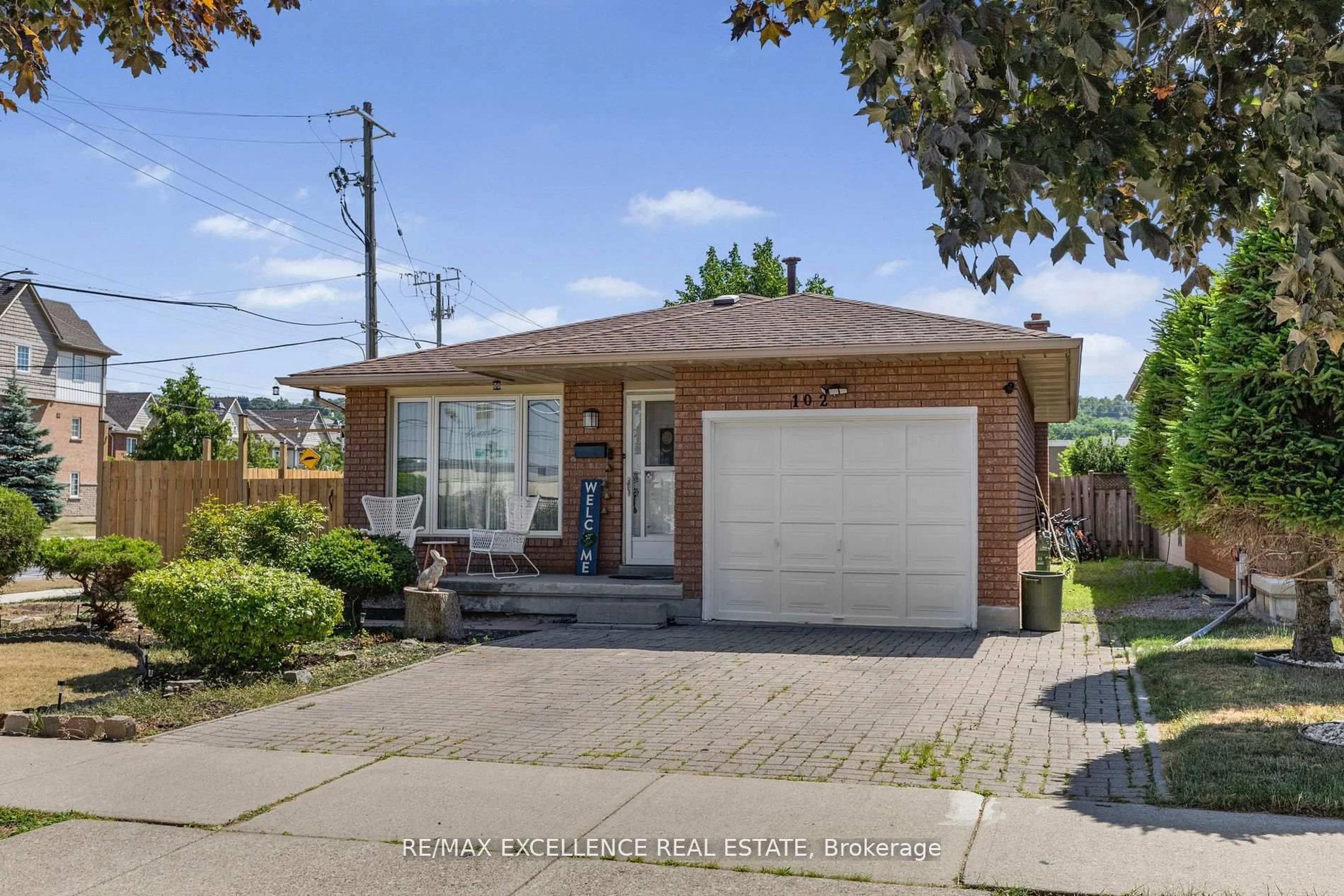 Home with brick exterior material, street for 102 Juniper Dr, Hamilton Ontario L8E 4G6