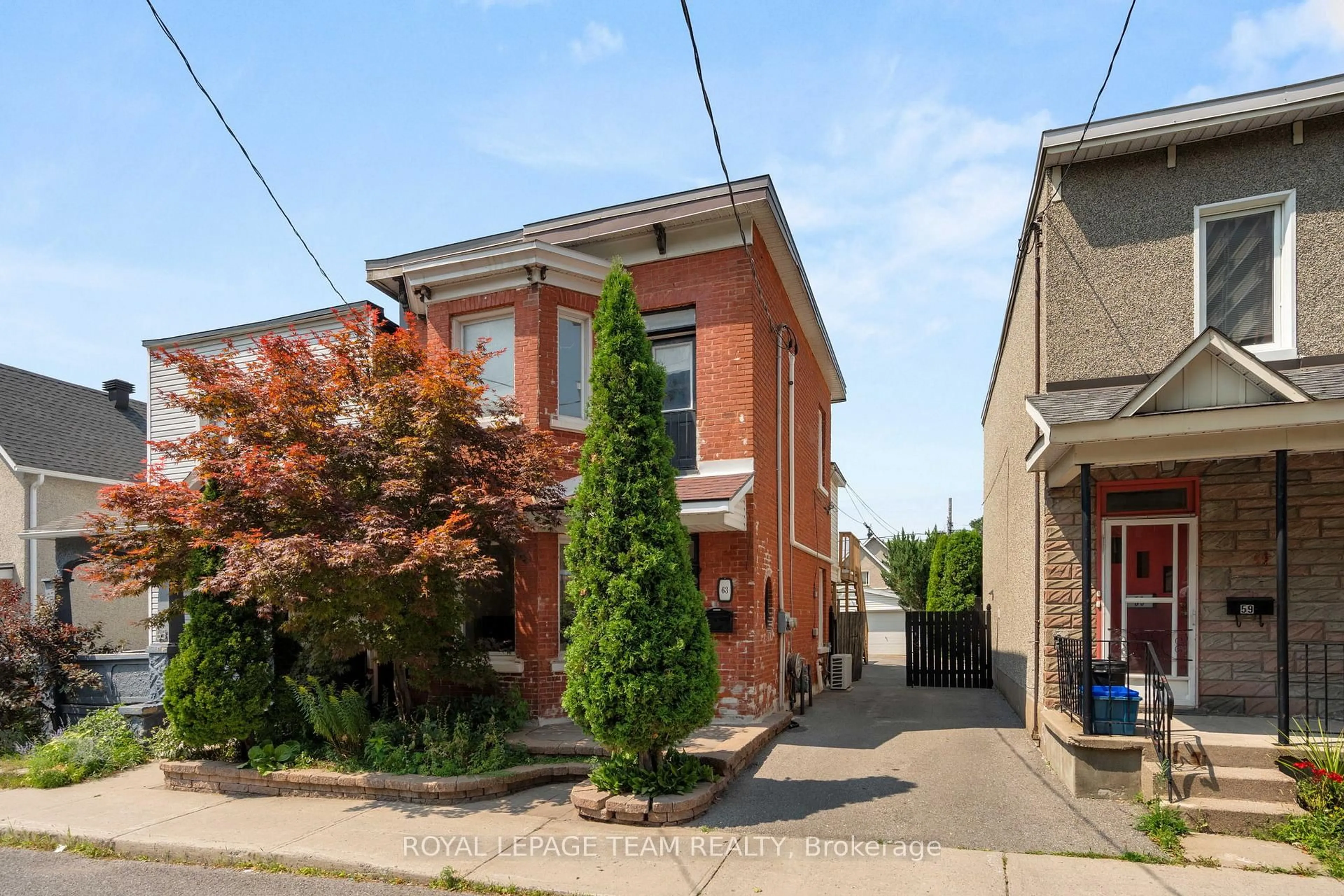 Home with brick exterior material, street for 63 Balsam St, Ottawa Ontario K1R 6W8