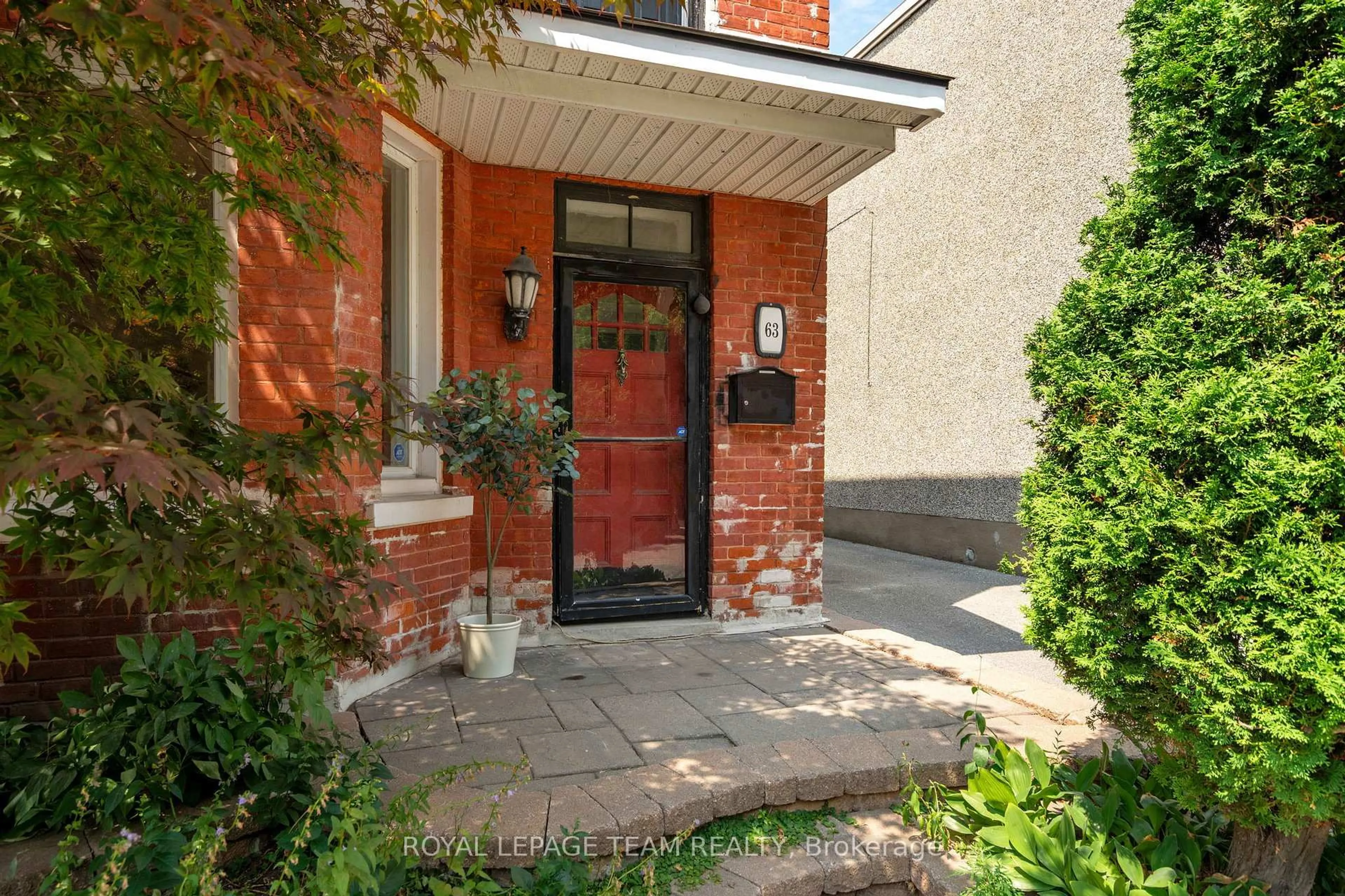 Home with brick exterior material, street for 63 Balsam St, Ottawa Ontario K1R 6W8