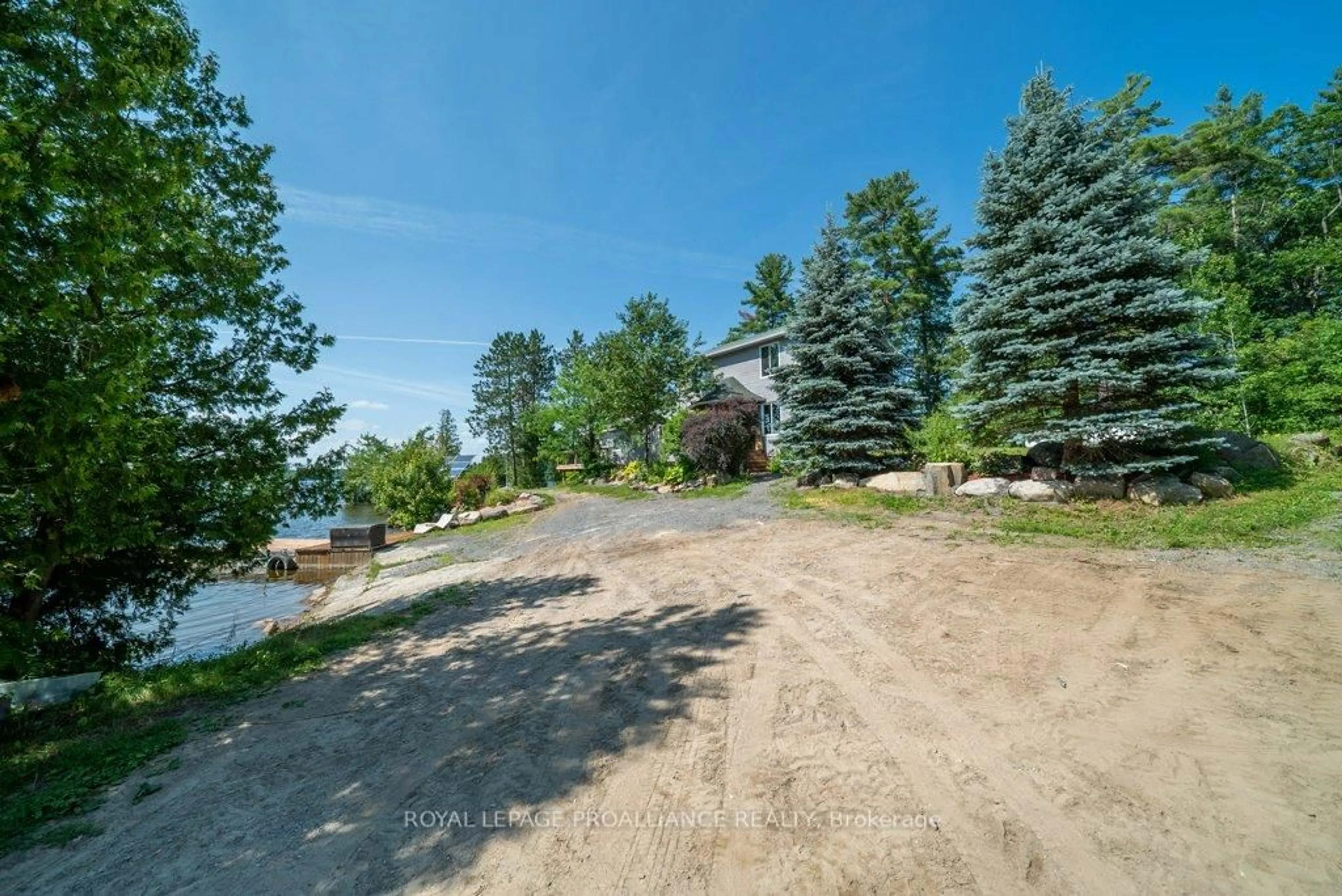 A pic from outside/outdoor area/front of a property/back of a property/a pic from drone, unknown for 2475 Alf's Bay Lane, Arden Ontario K0H 1B0