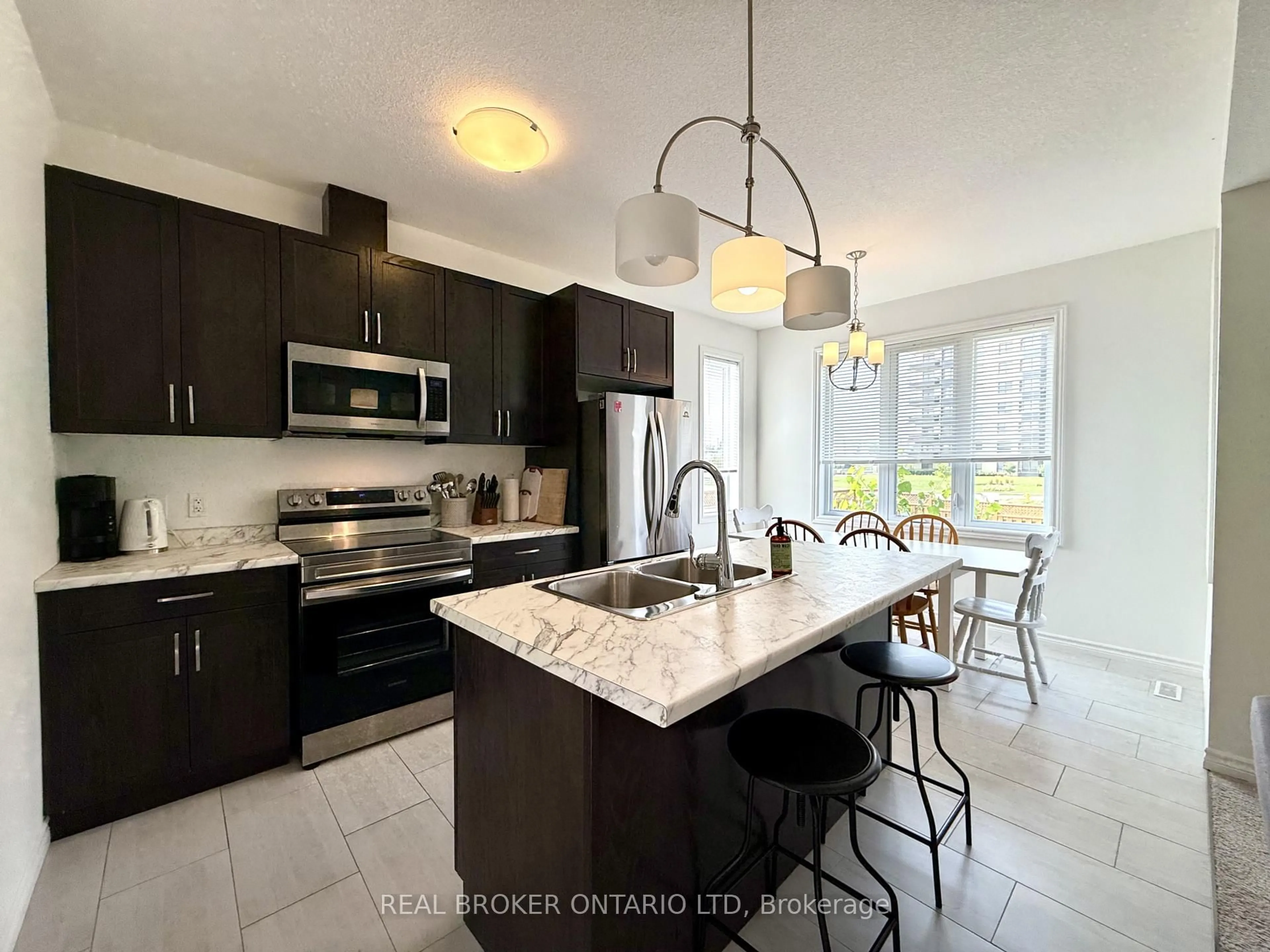 Open concept kitchen, ceramic/tile floor for 1634 Noah Bend, London North Ontario N3B 2Z1