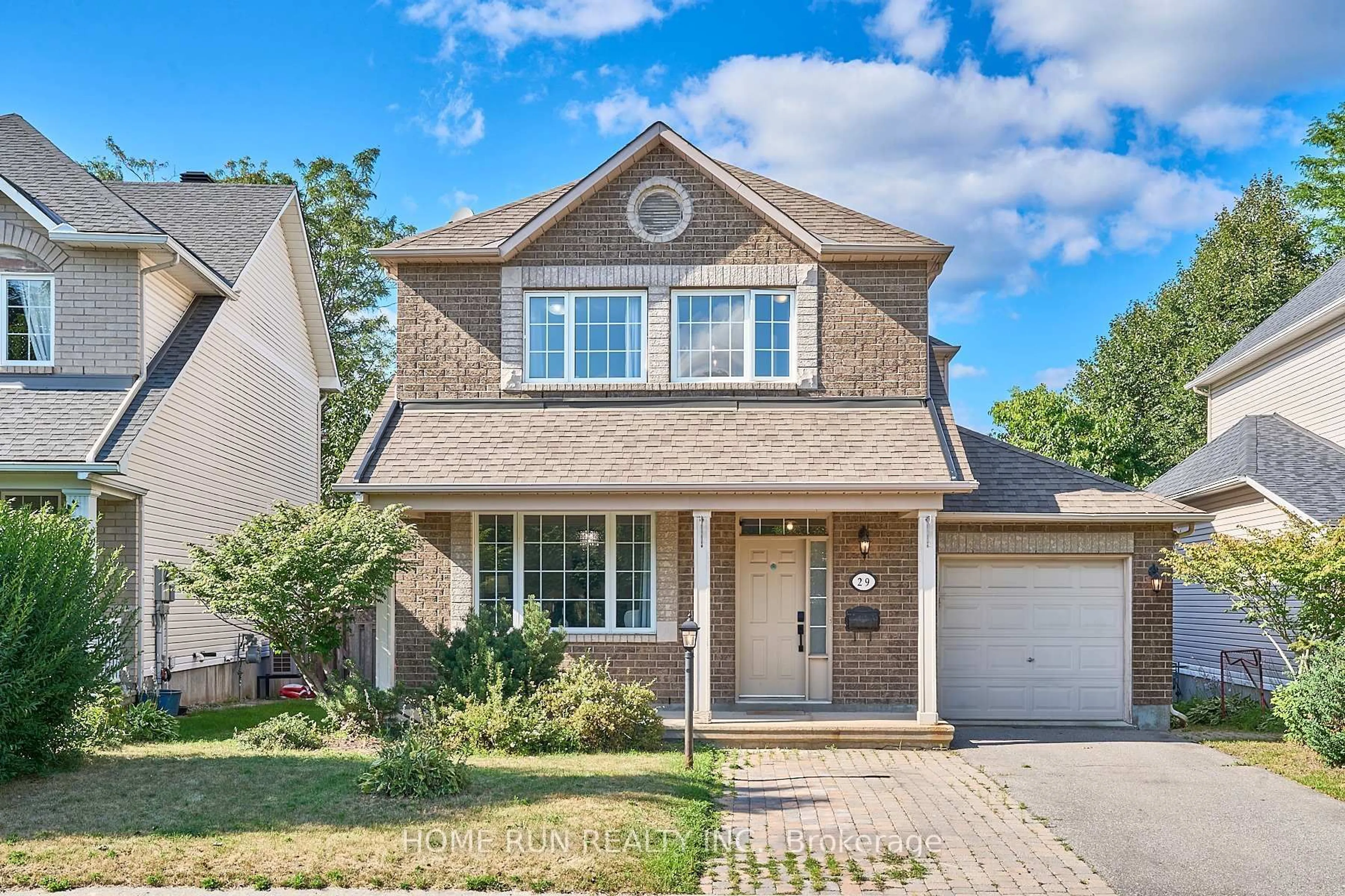 Home with brick exterior material, street for 29 Manorgate Pl, Ottawa Ontario K2G 6L3
