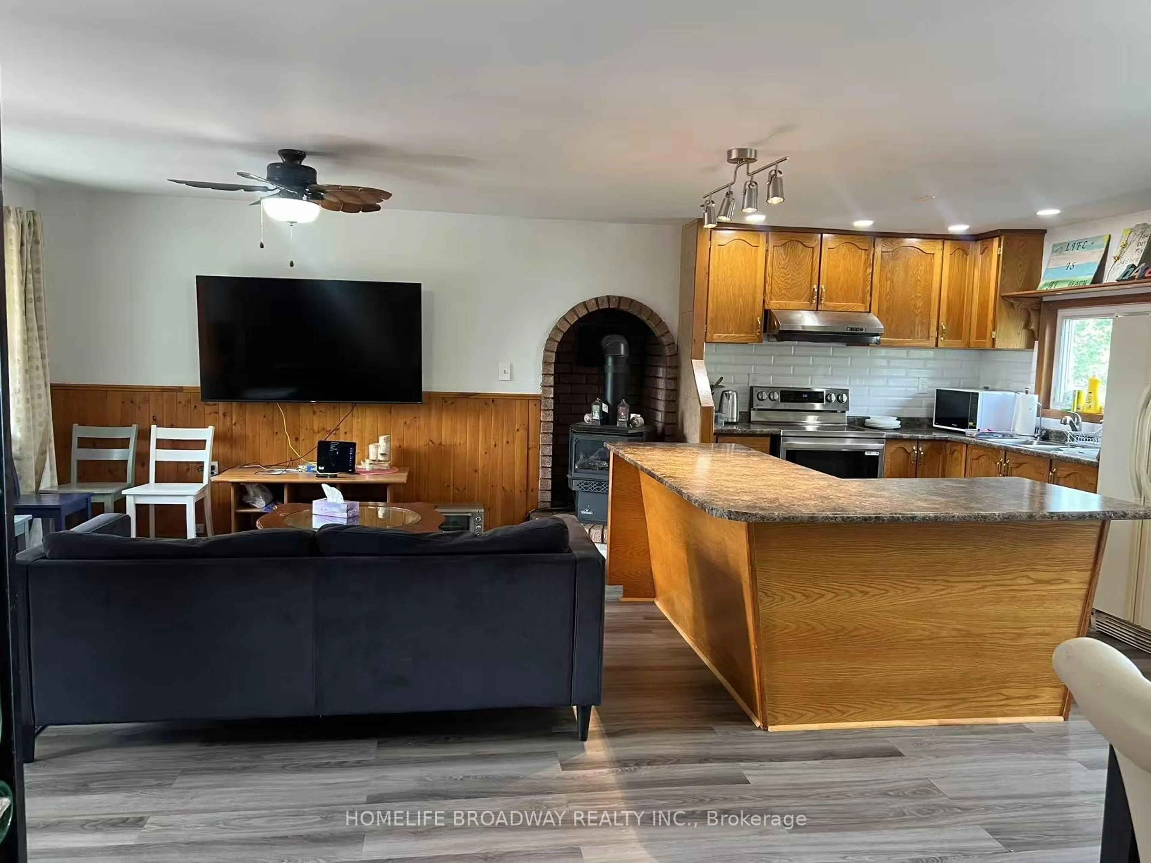 Open concept kitchen, wood/laminate floor for 1389 Portage Rd, Kawartha Lakes Ontario K0M 2B0