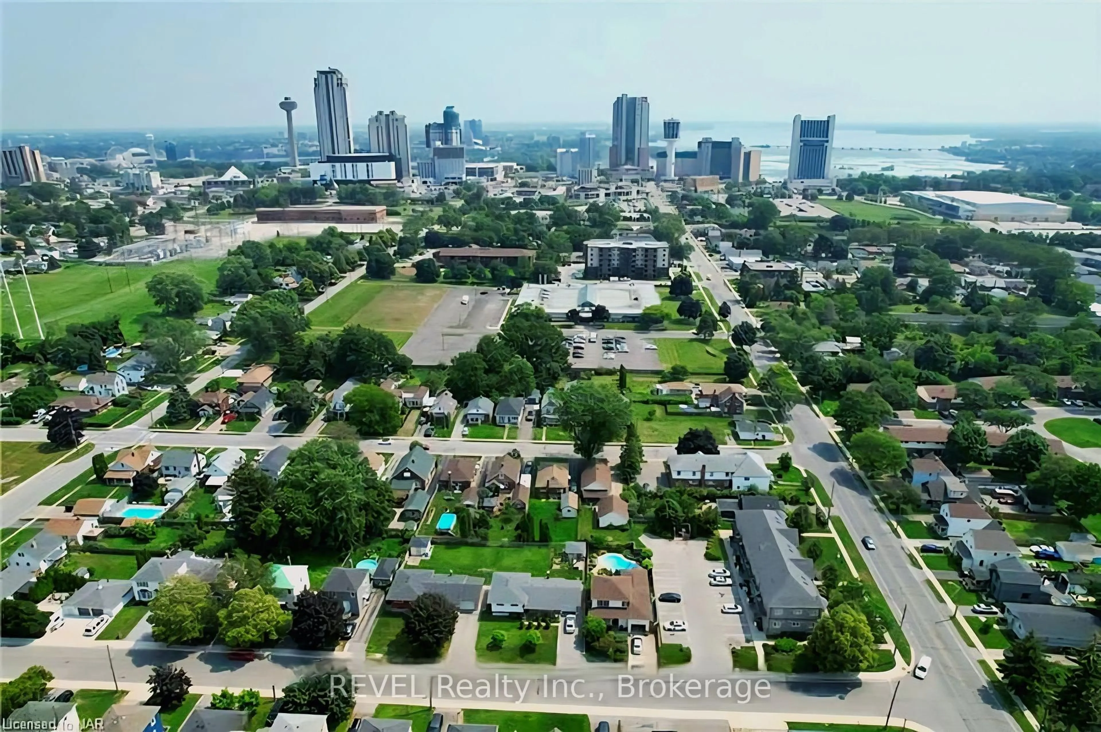 A pic from outside/outdoor area/front of a property/back of a property/a pic from drone, city buildings view from balcony for 6045 Dunn St #104, Niagara Falls Ontario L2G 2P2